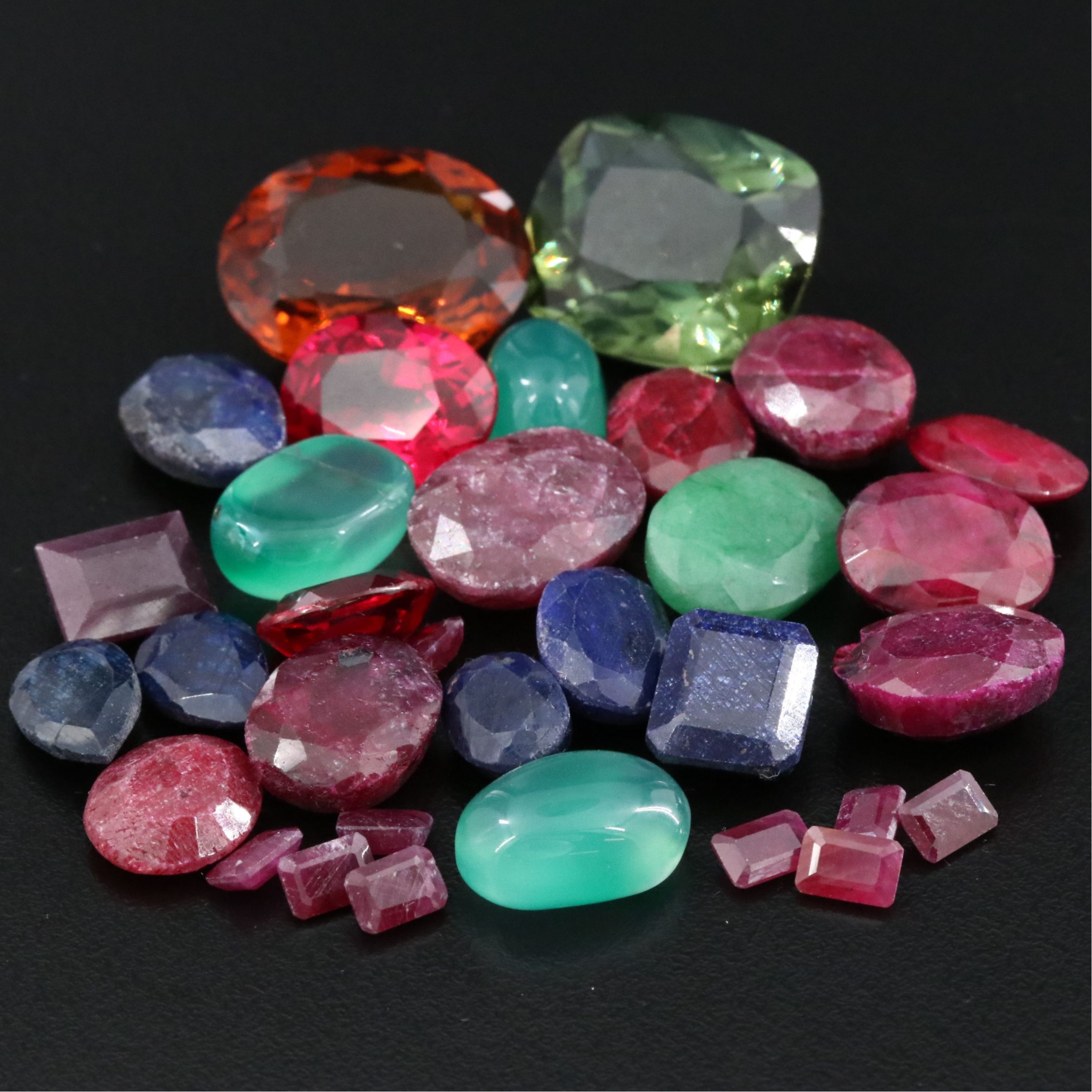 Loose 216.76 CTW Gemstone Lot Featuring Lab Grown Ruby, Citrine, Chalcedony