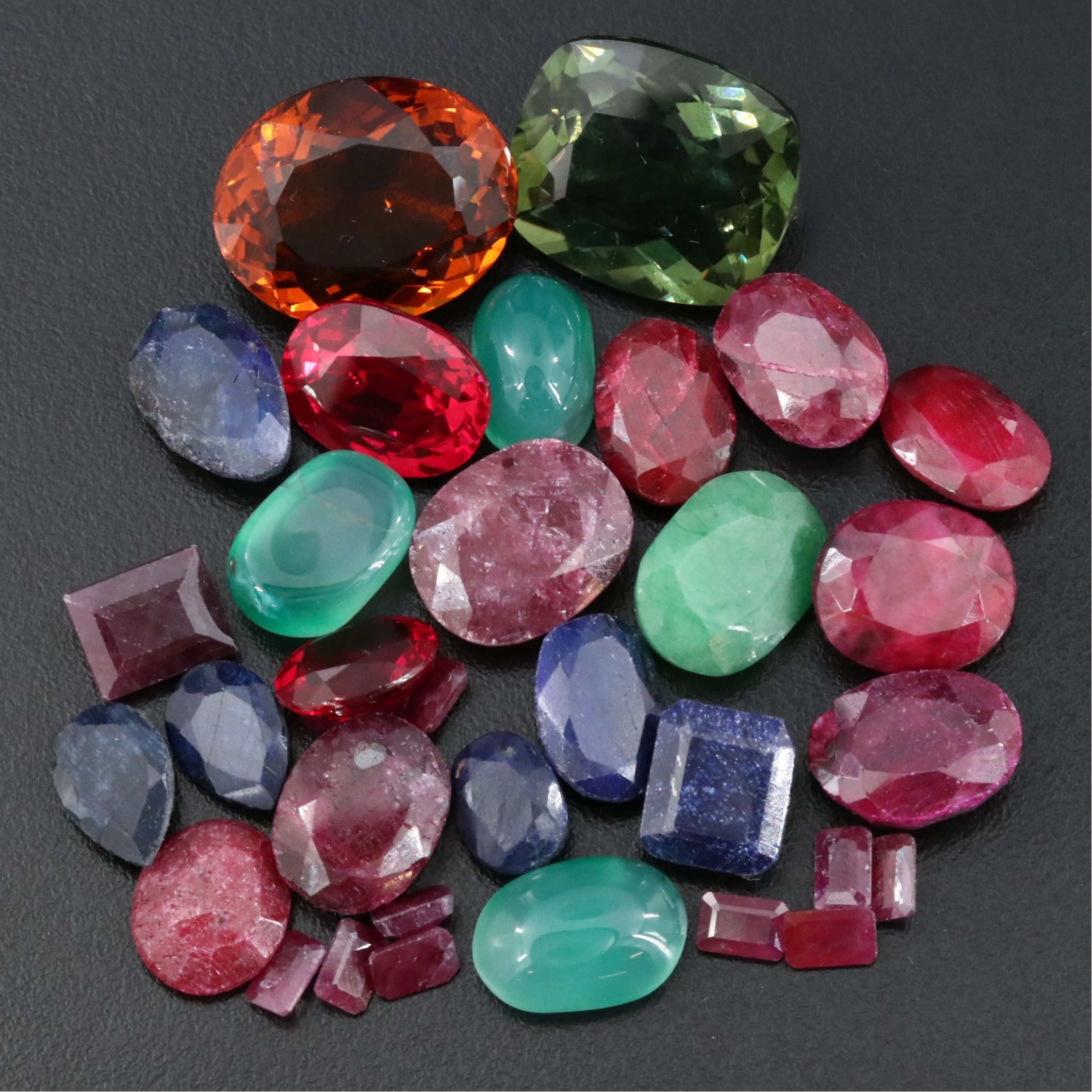 Loose 216.76 CTW Gemstone Lot Featuring Lab Grown Ruby, Citrine, Chalcedony
