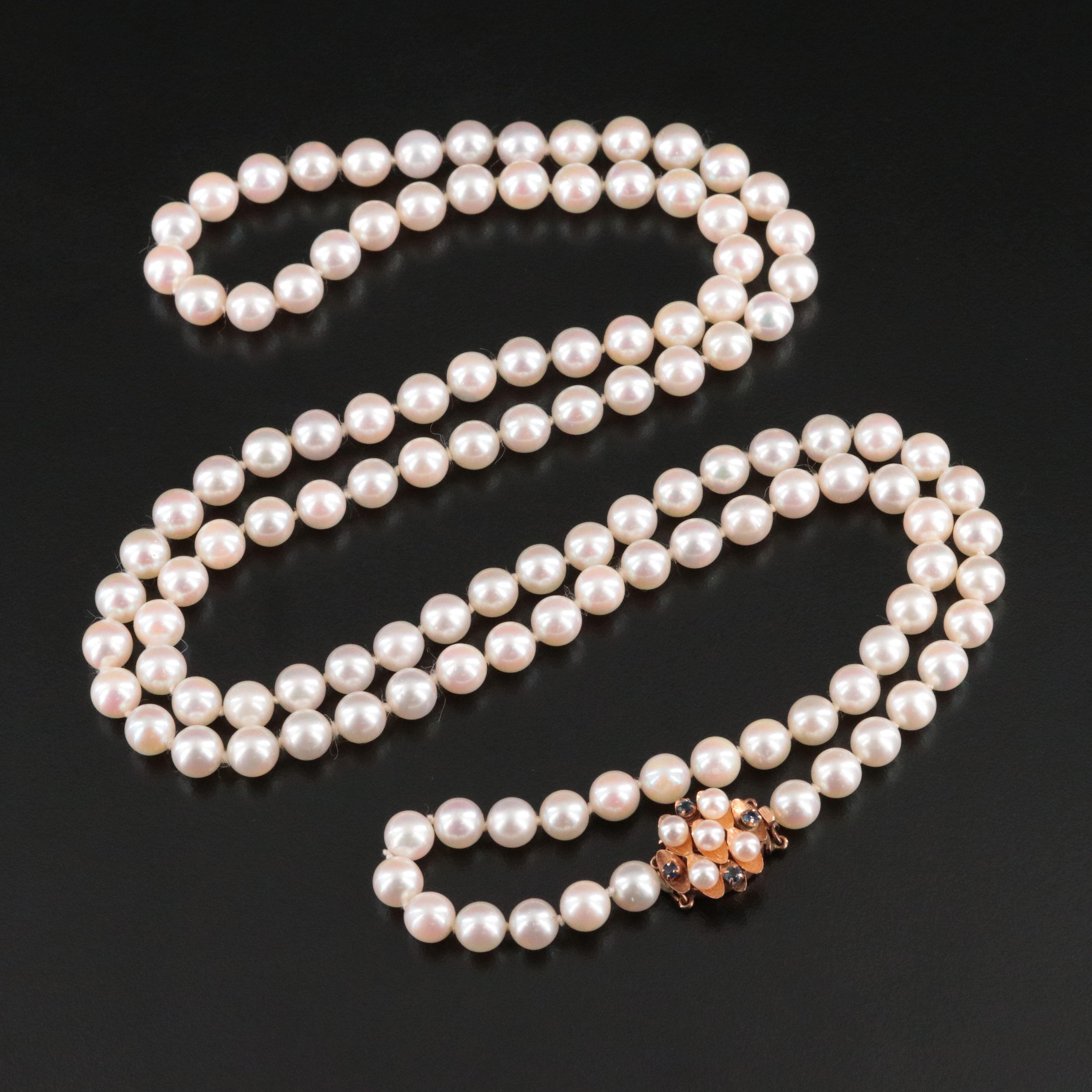 Opera Length Pearl Necklace with a 14K Pearl and Sapphire Accented Clasp