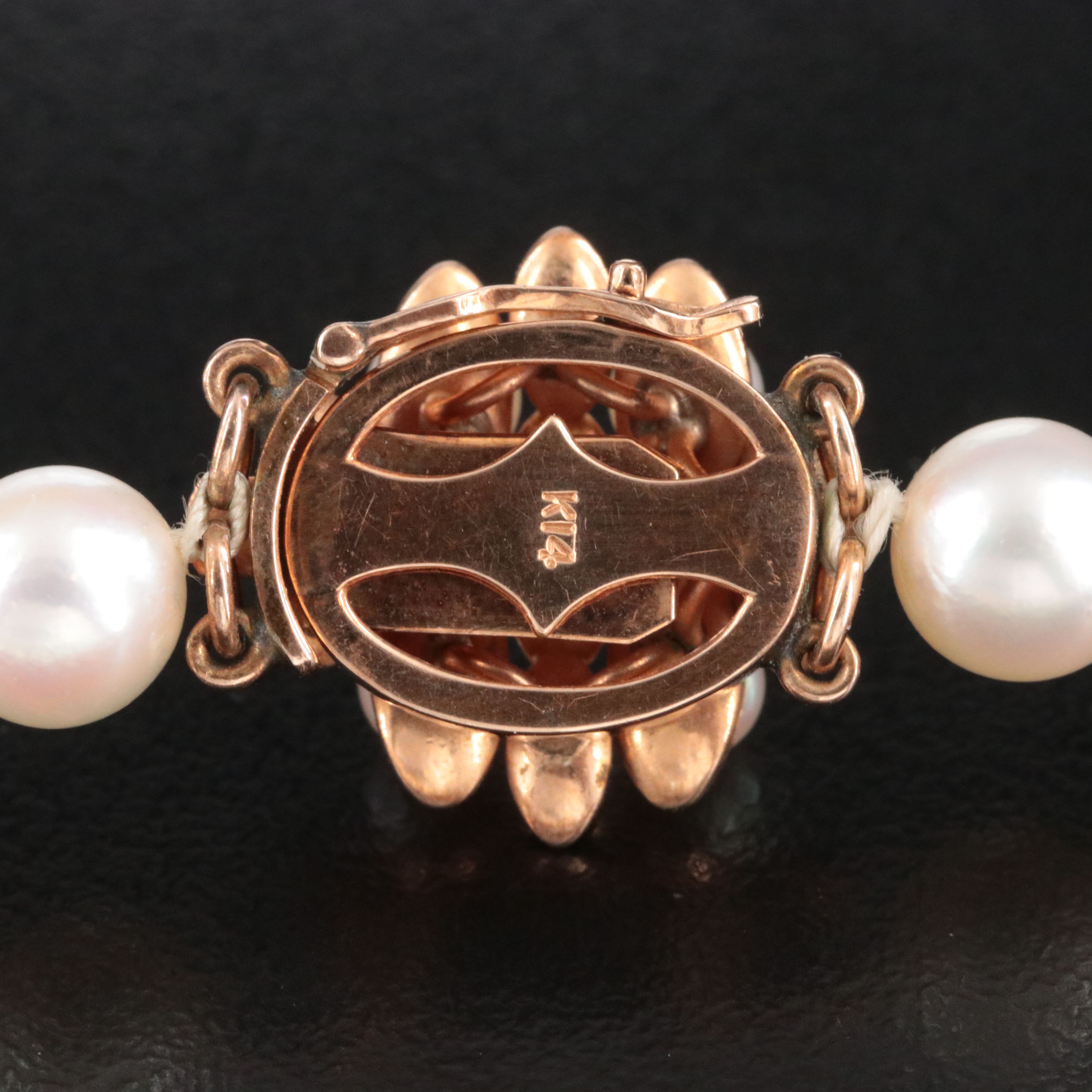 Opera Length Pearl Necklace with a 14K Pearl and Sapphire Accented Clasp