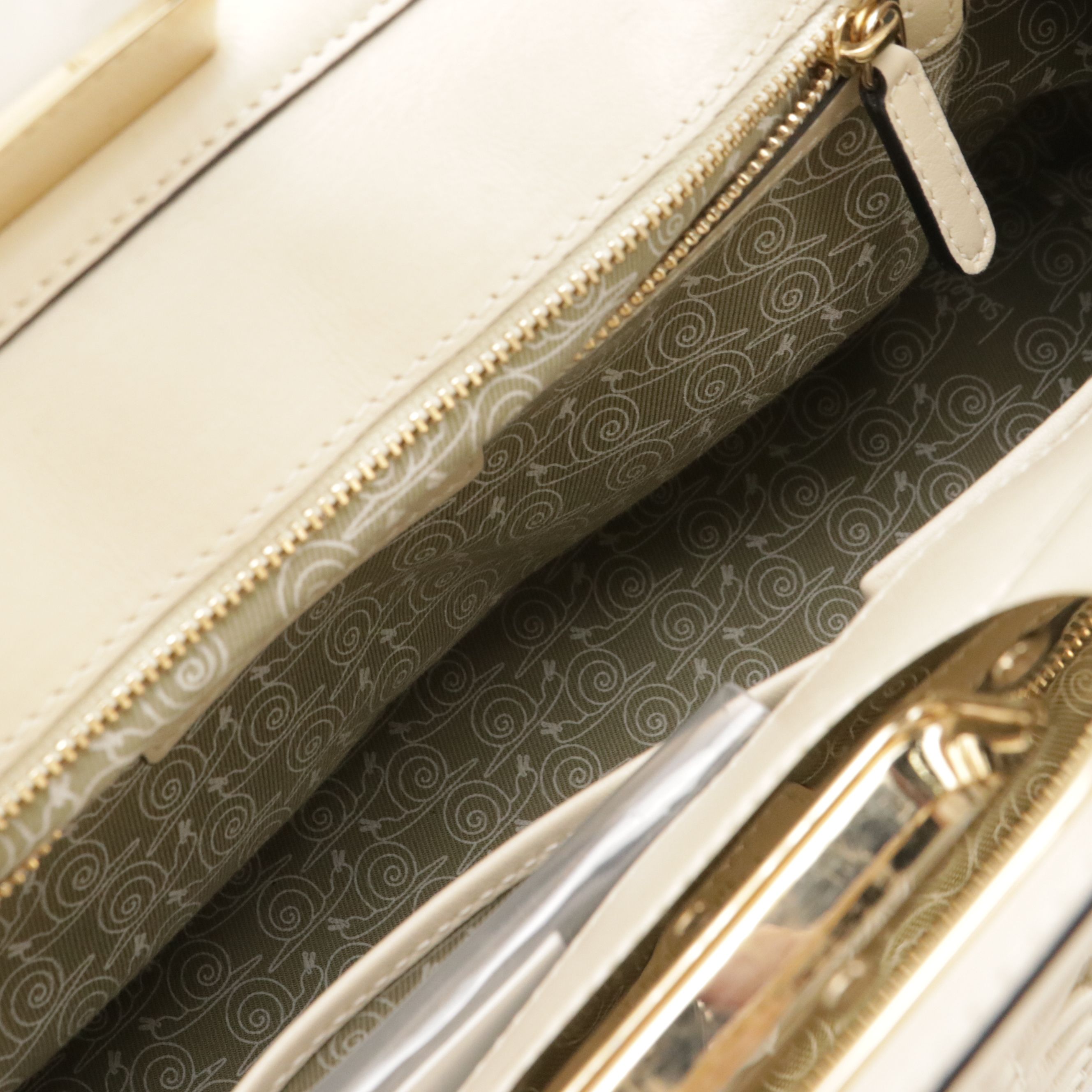 BVLGARI Isabella Rossellini Turnlock Bag in Neutral Matelassé Leather