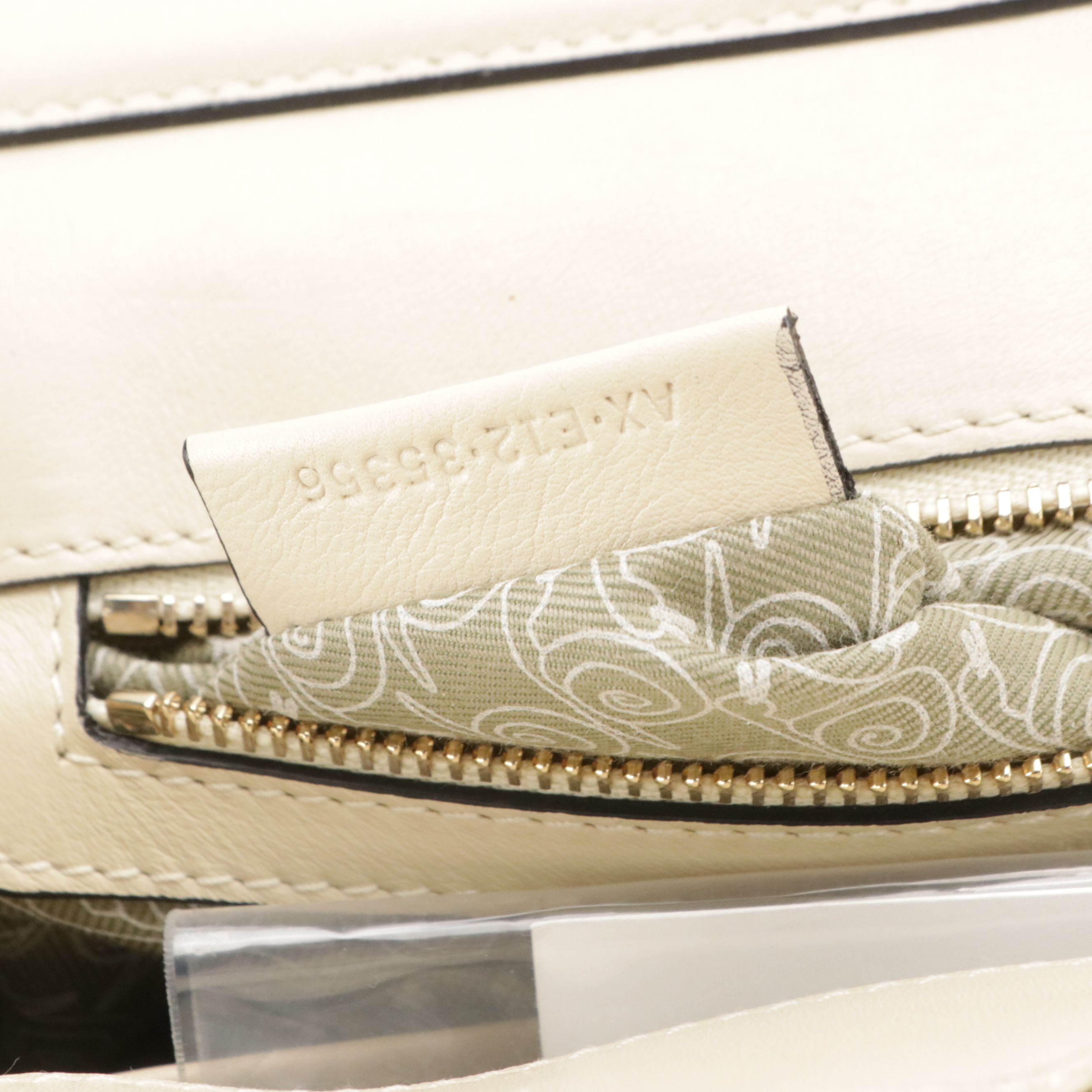 BVLGARI Isabella Rossellini Turnlock Bag in Neutral Matelassé Leather