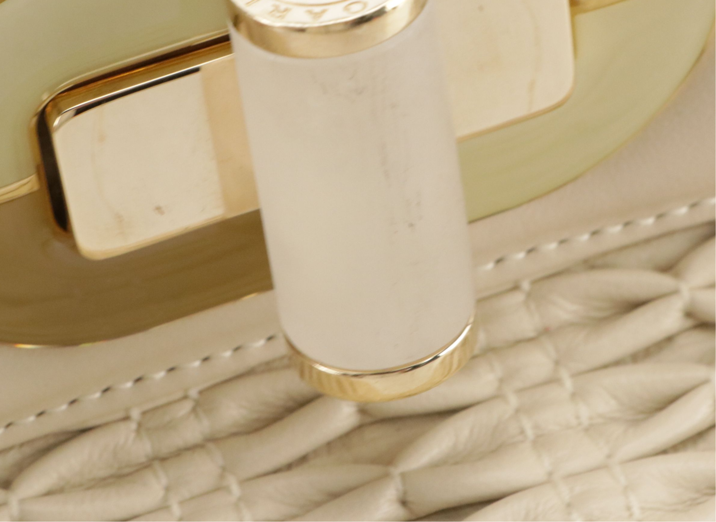 BVLGARI Isabella Rossellini Turnlock Bag in Neutral Matelassé Leather