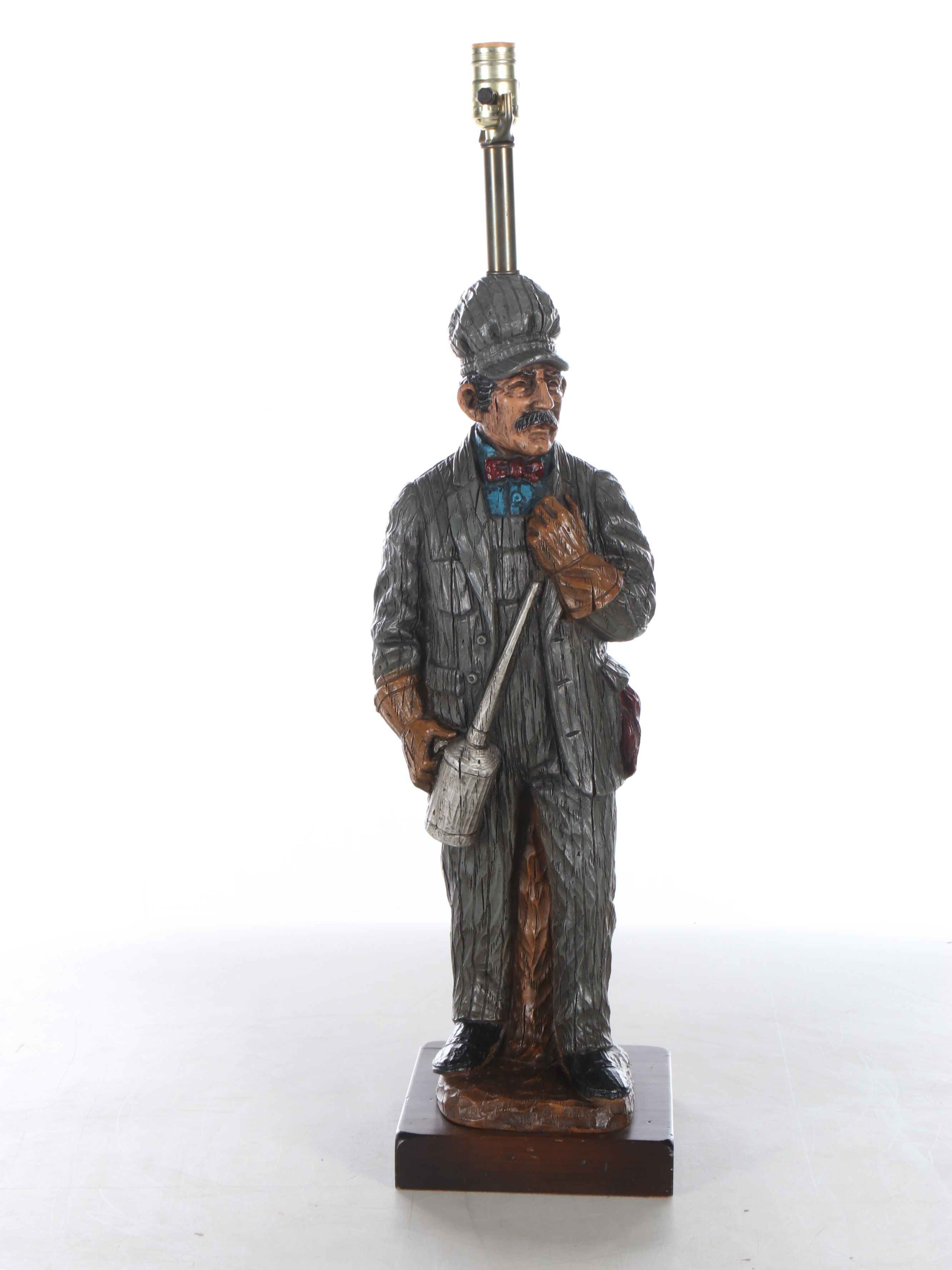 Carved Resin Train Conductor Table Lamp