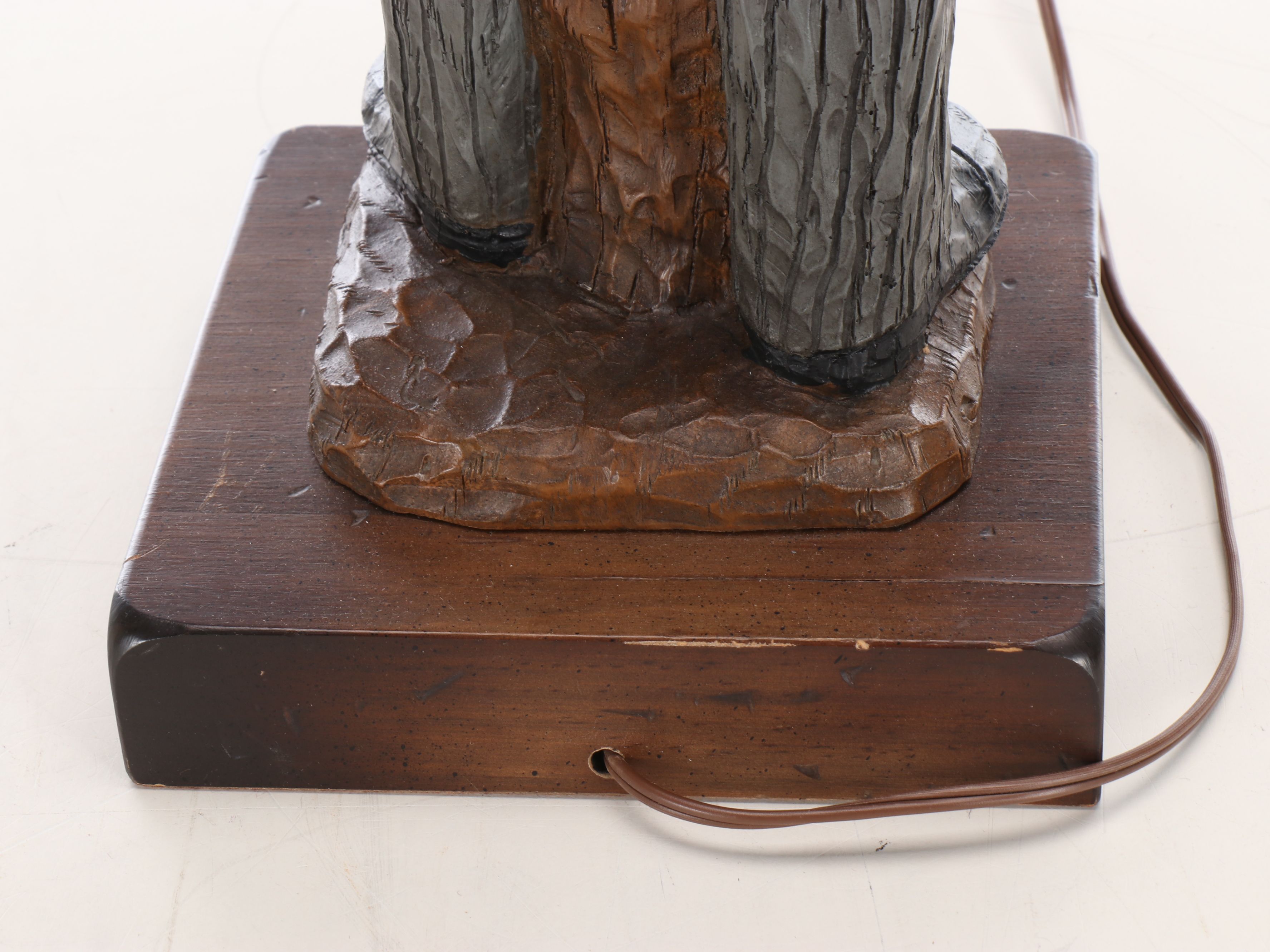 Carved Resin Train Conductor Table Lamp