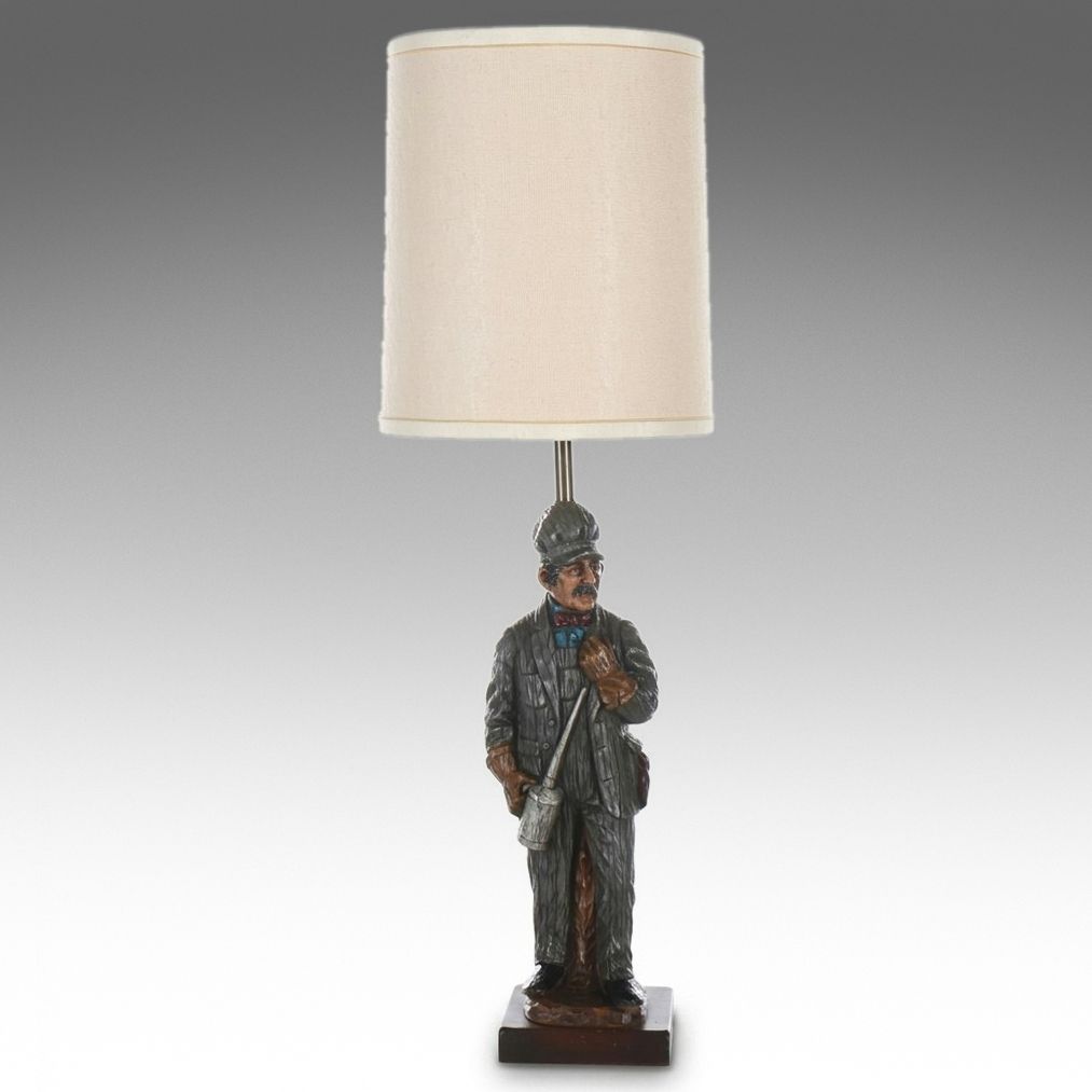 Carved Resin Train Conductor Table Lamp