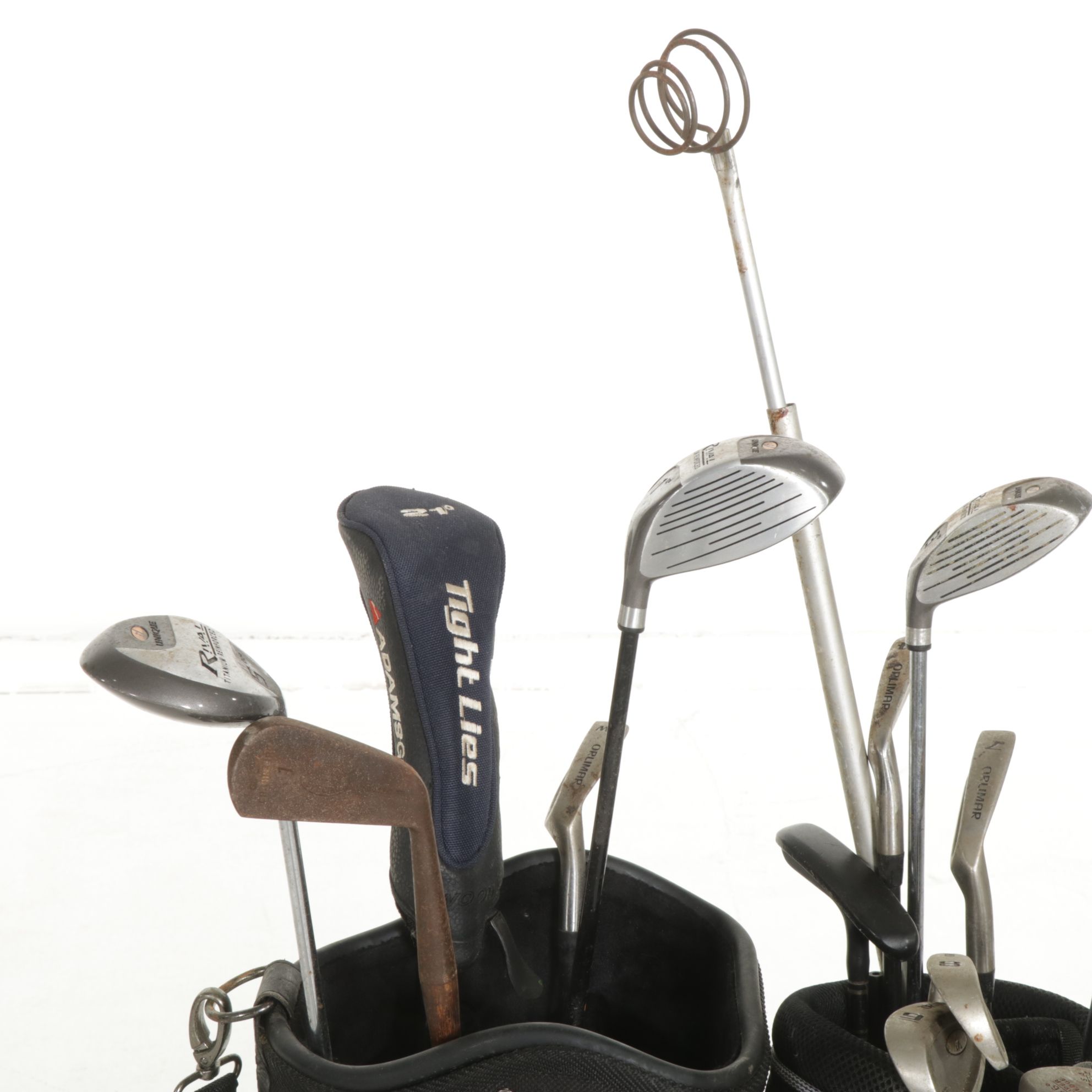 Two Golf Bags Including a Rival Titanium Reinforced 1-Driver and More Golf Clubs