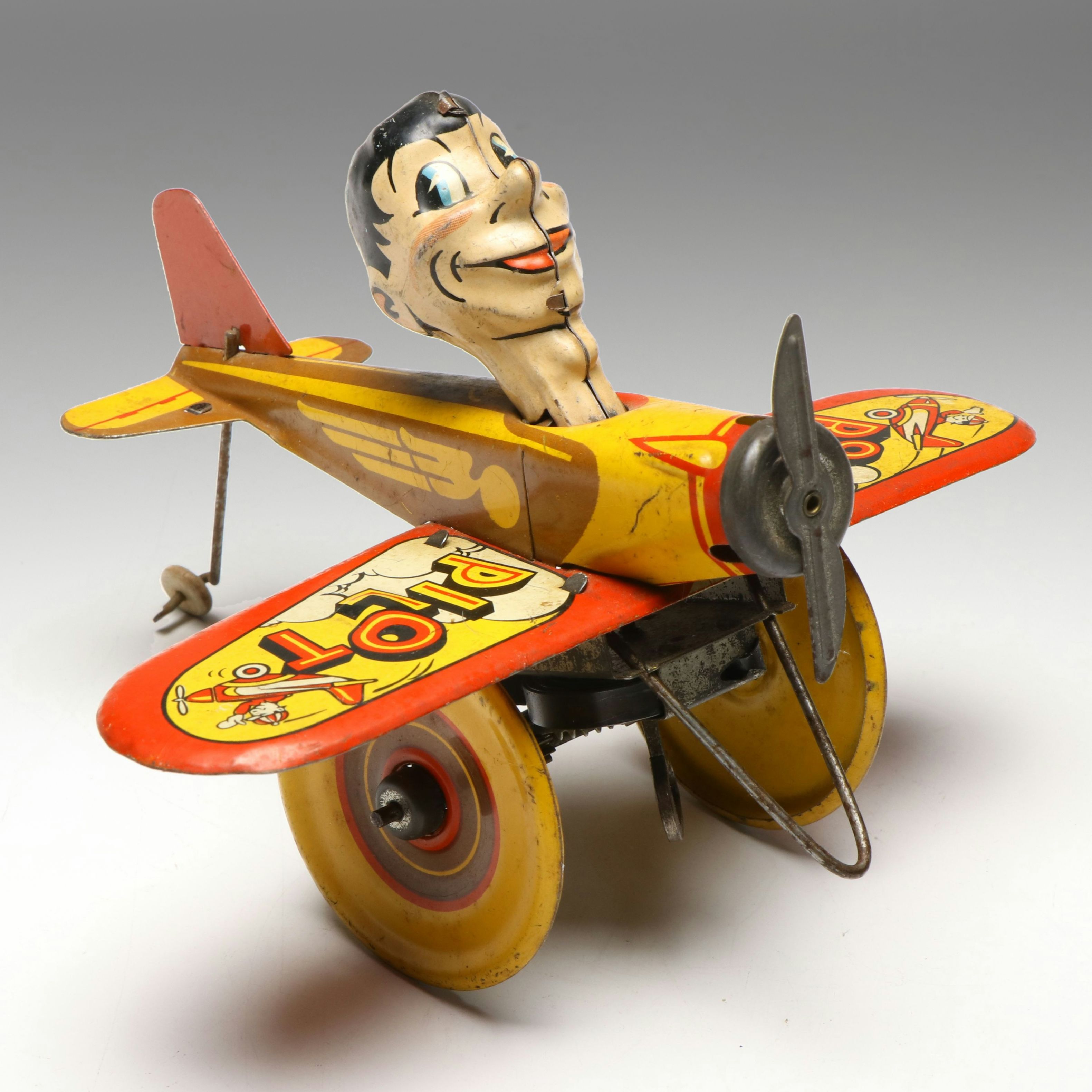 Marx "Rookie Pilot" Wind Up Tin Toy Airplane, 1940s