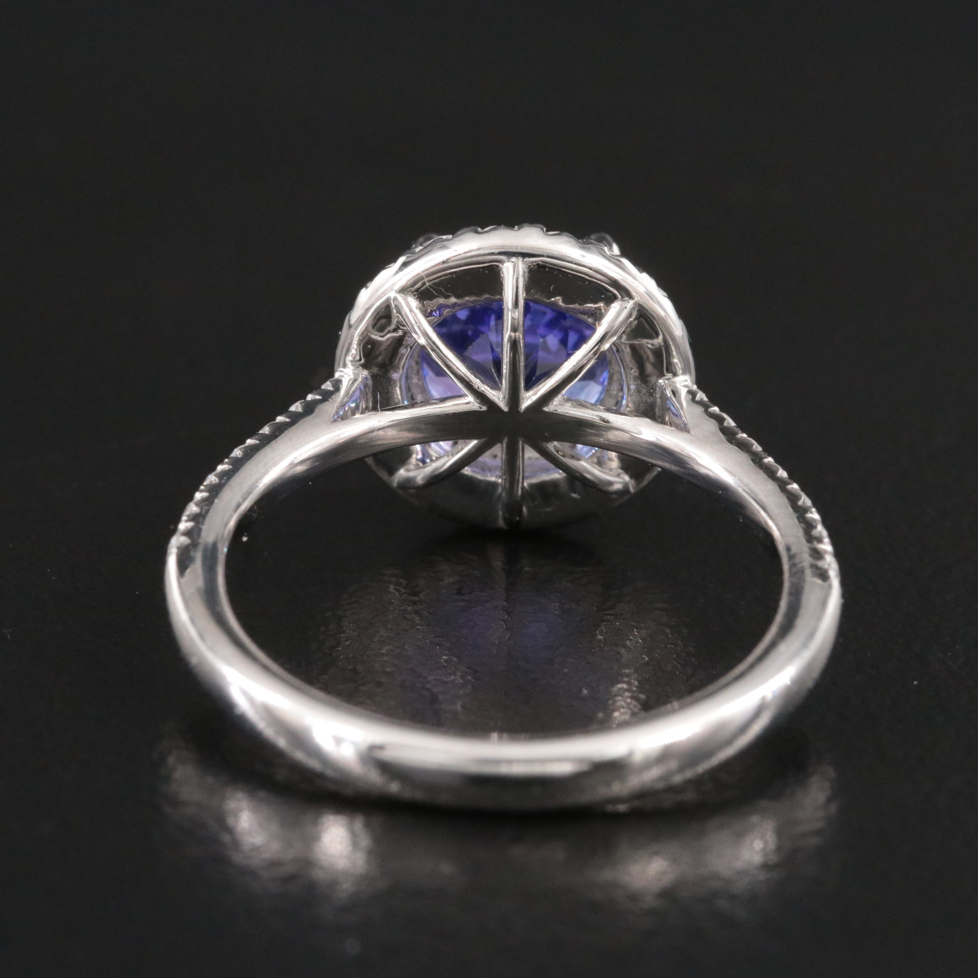 Platinum 2.33 CT Tanzanite Ring with Diamond Halo and Accents