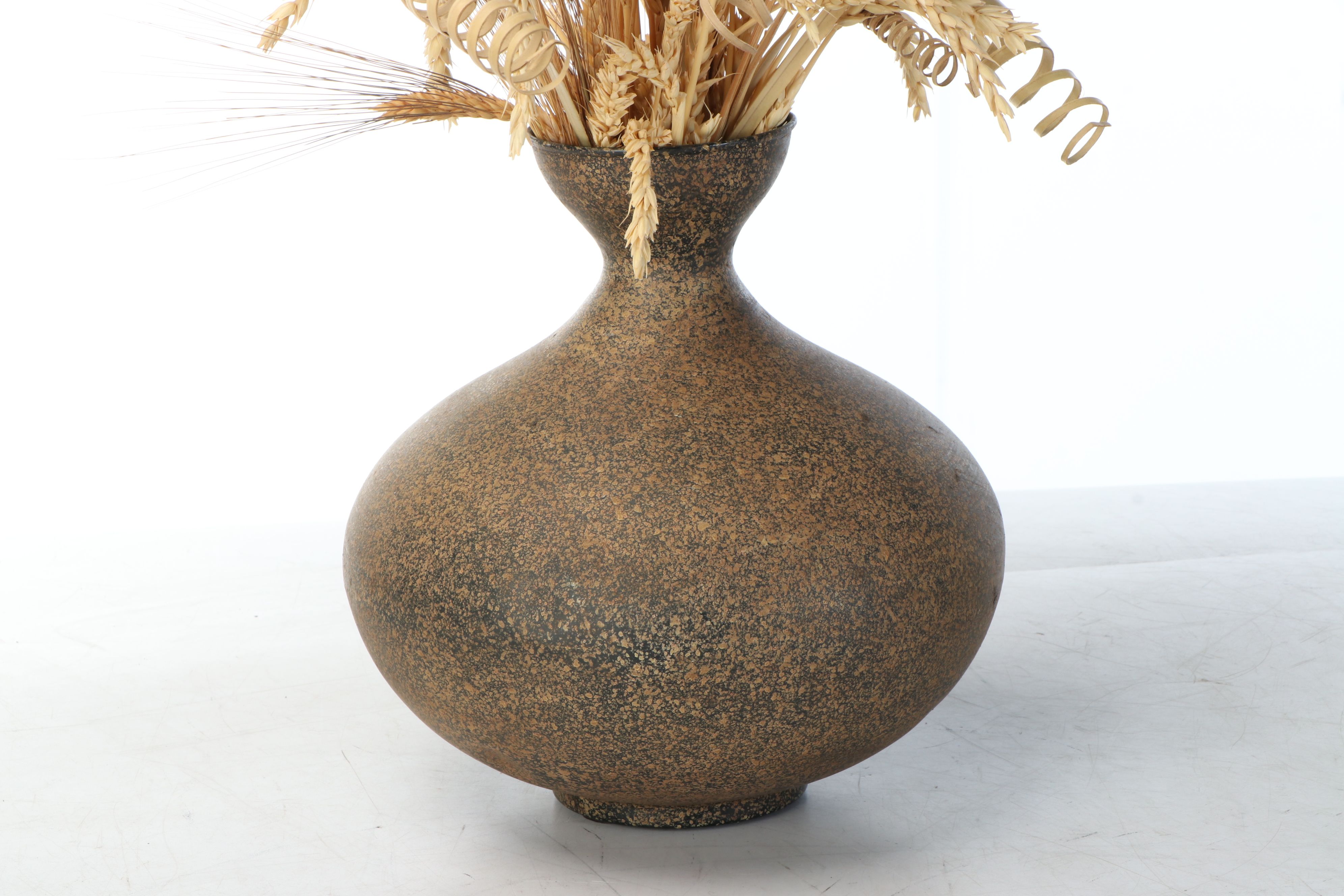 Composite Leaf Imprint Wall Panels with Dried Plants in Ceramic Vase