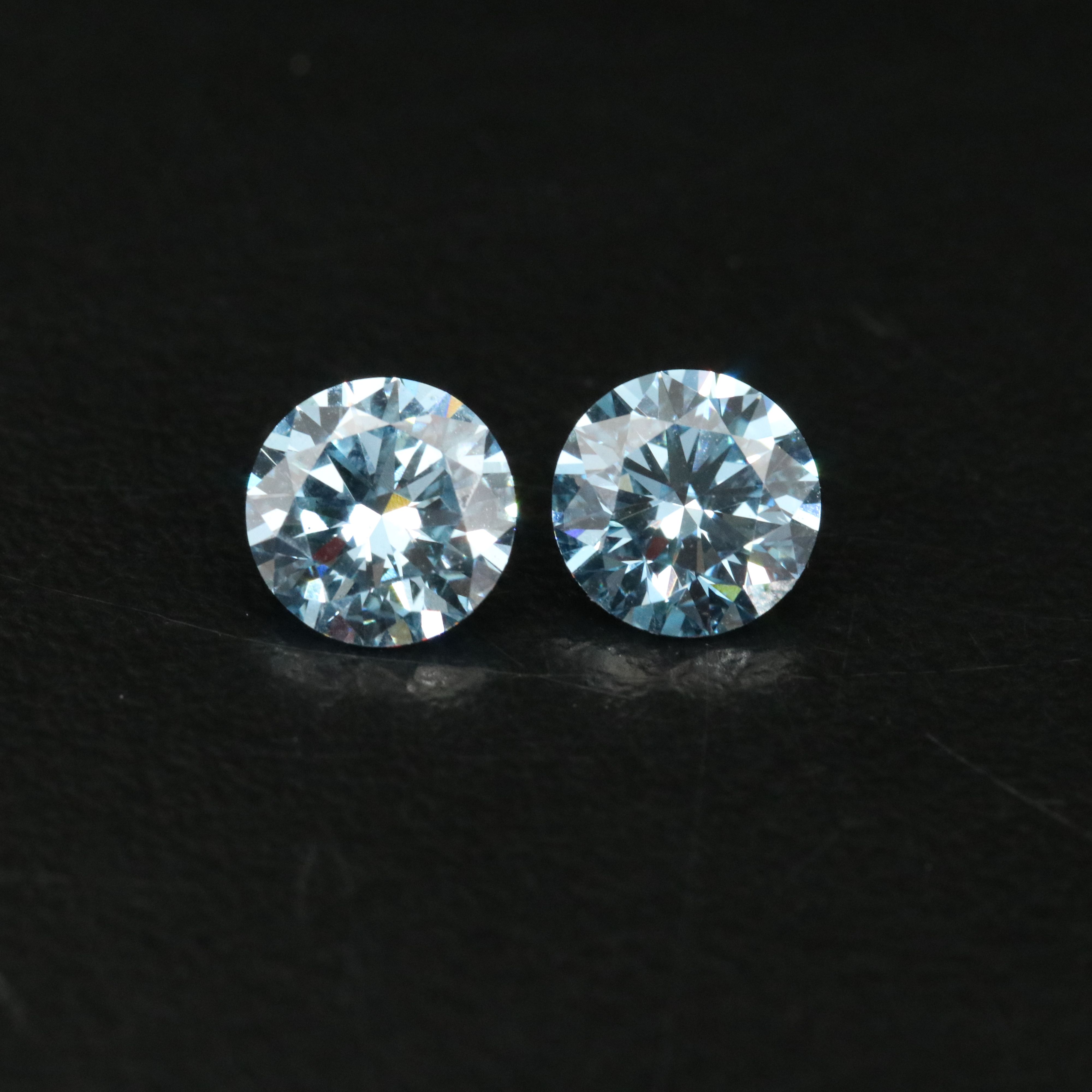 Loose 2.01 CTW Matched Pair Lab Grown Fancy Vivid Blue Diamonds with IGI Reports