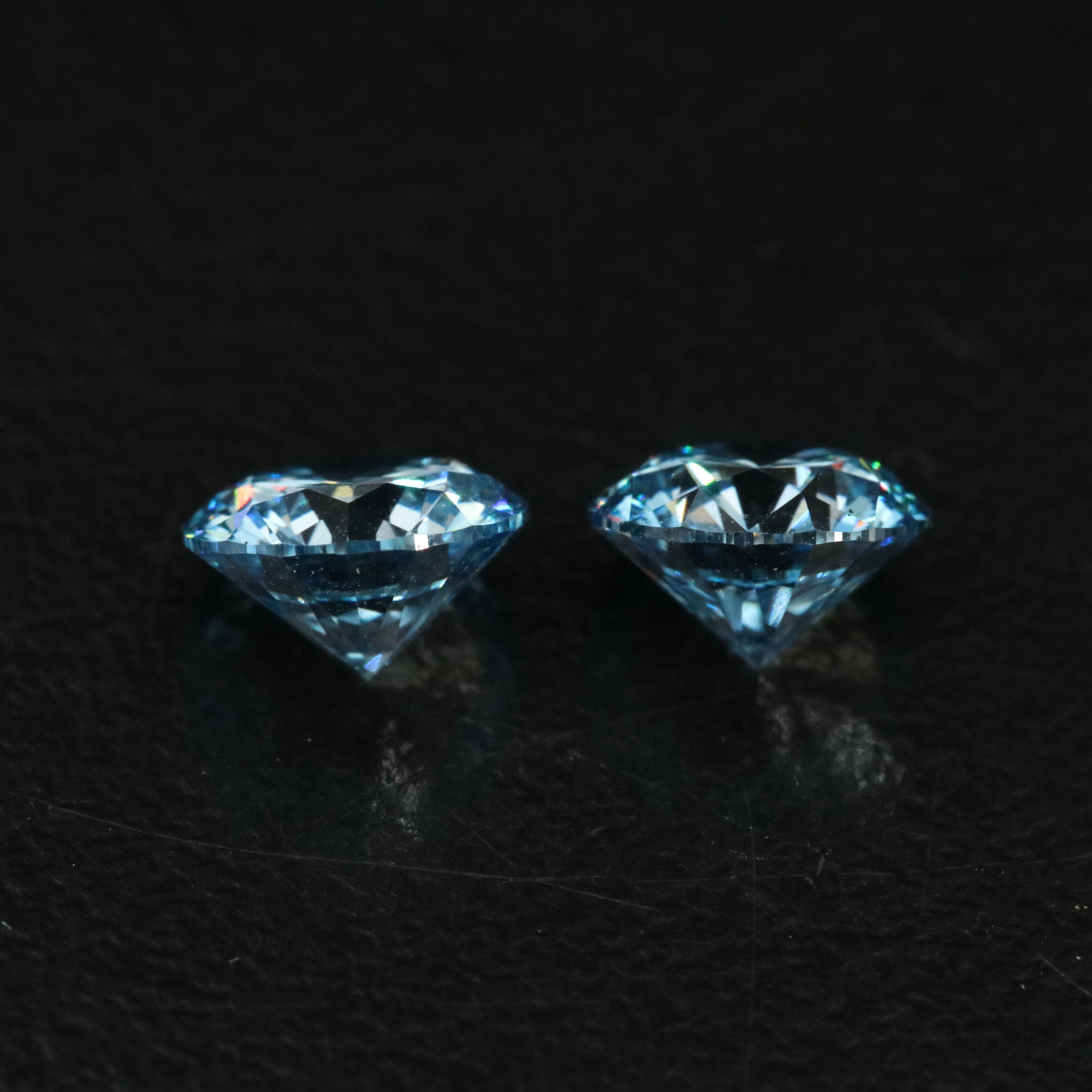 Loose 2.01 CTW Matched Pair Lab Grown Fancy Vivid Blue Diamonds with IGI Reports