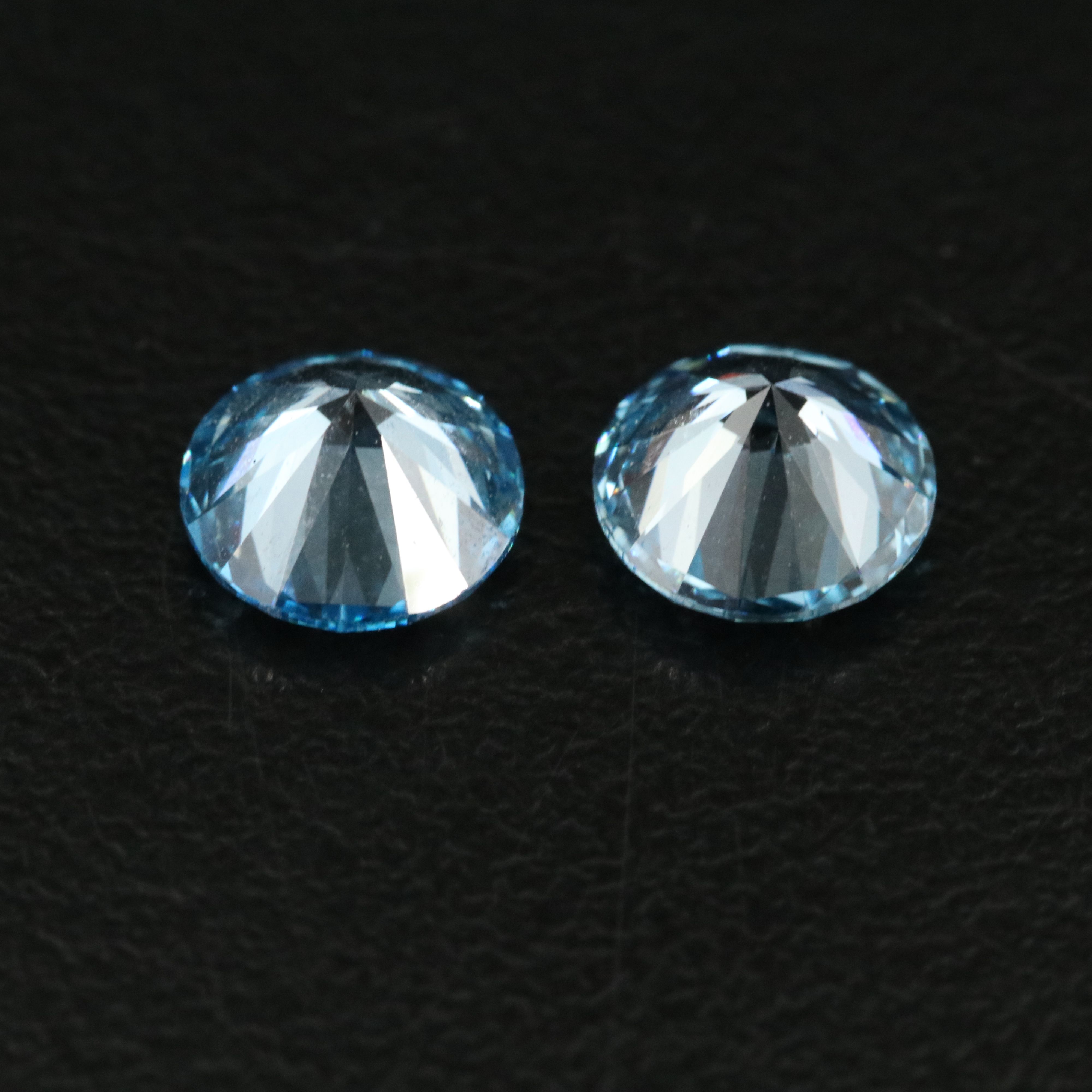 Loose 2.01 CTW Matched Pair Lab Grown Fancy Vivid Blue Diamonds with IGI Reports