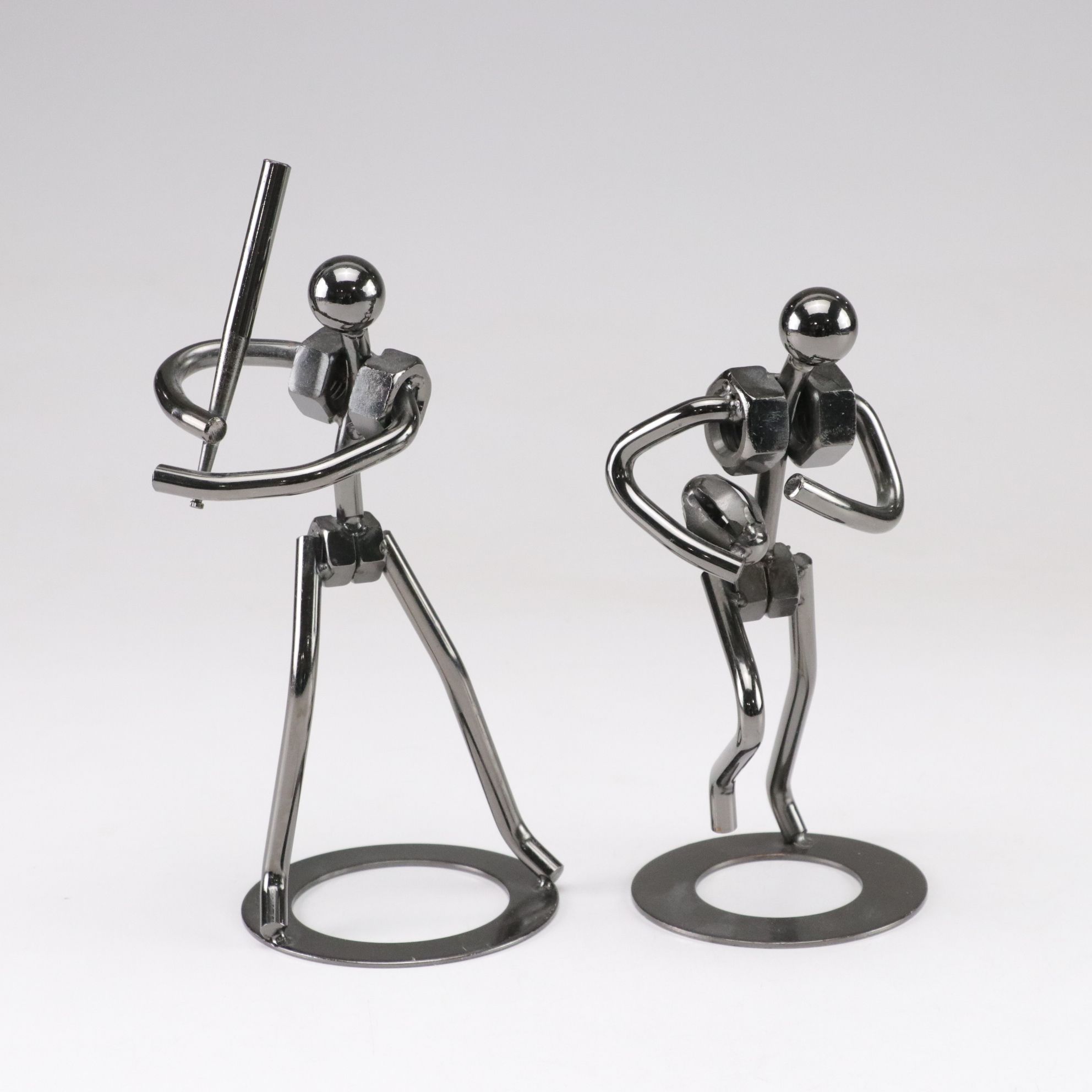 Repurposed Nut and Bolt Sculptures Showcasing Athletic Action Poses