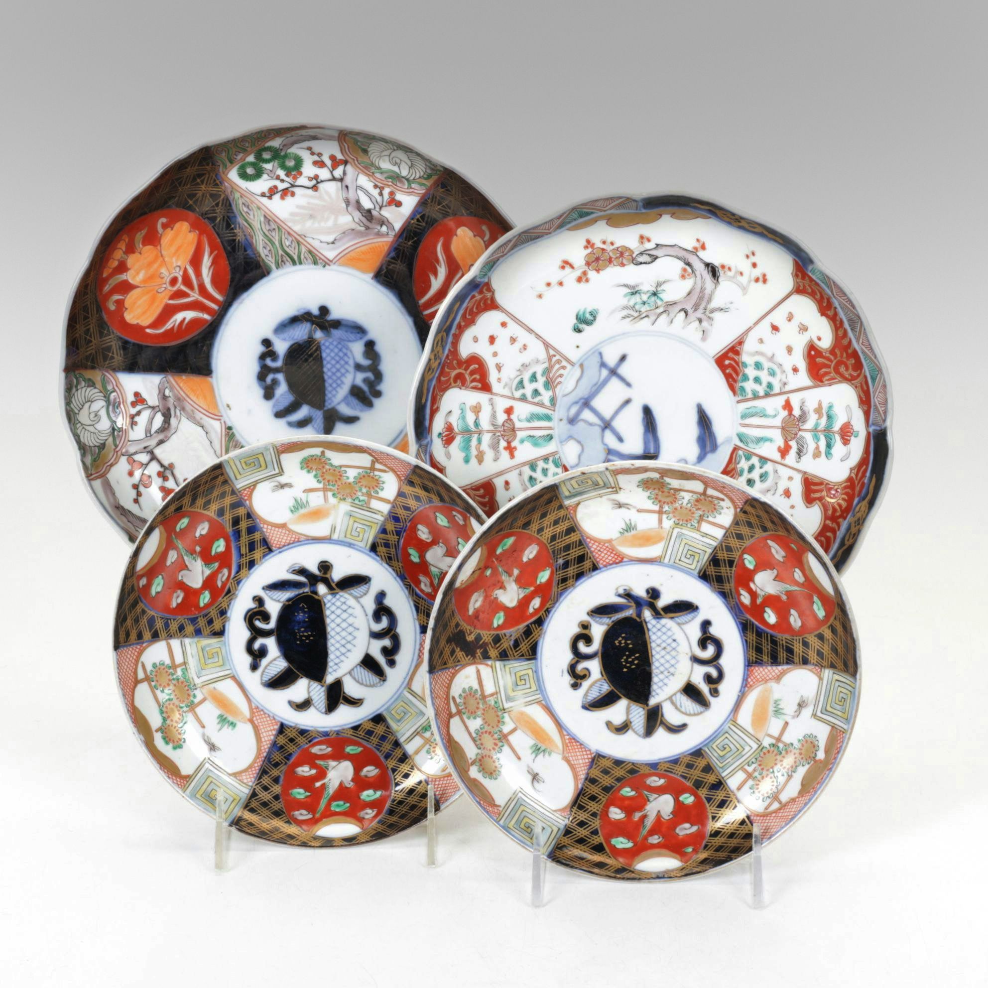 Japanese Imari Porcelain Deep Plates with Intricate Motifs