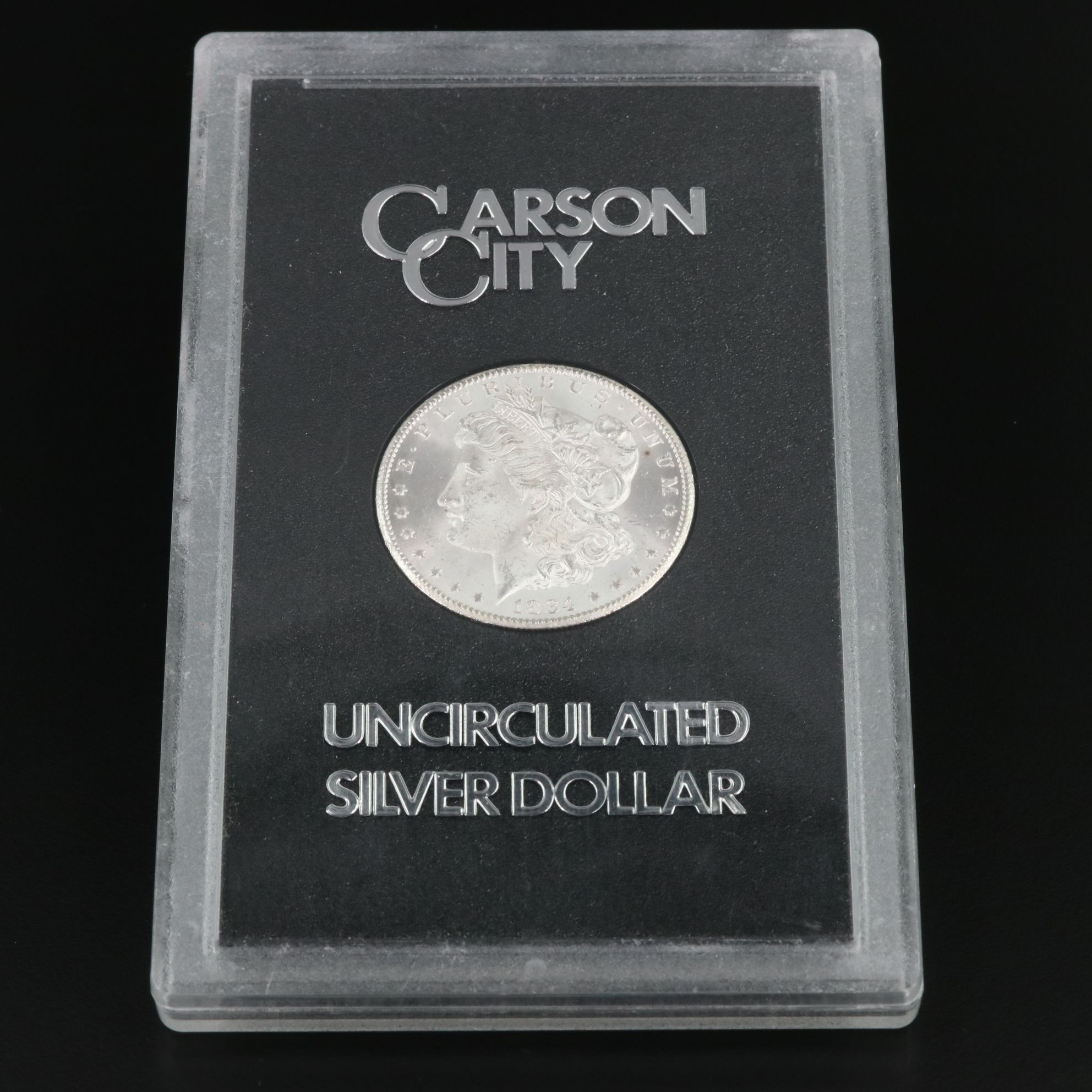 1884-CC Morgan Silver Dollar in a GSA Holder
