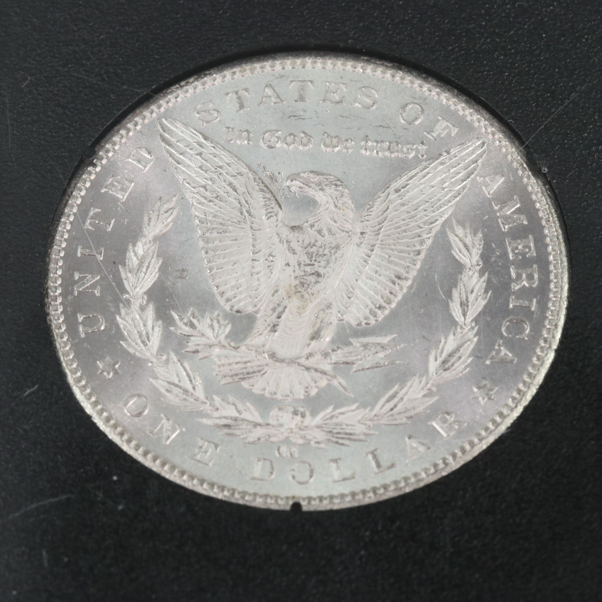 1884-CC Morgan Silver Dollar in a GSA Holder