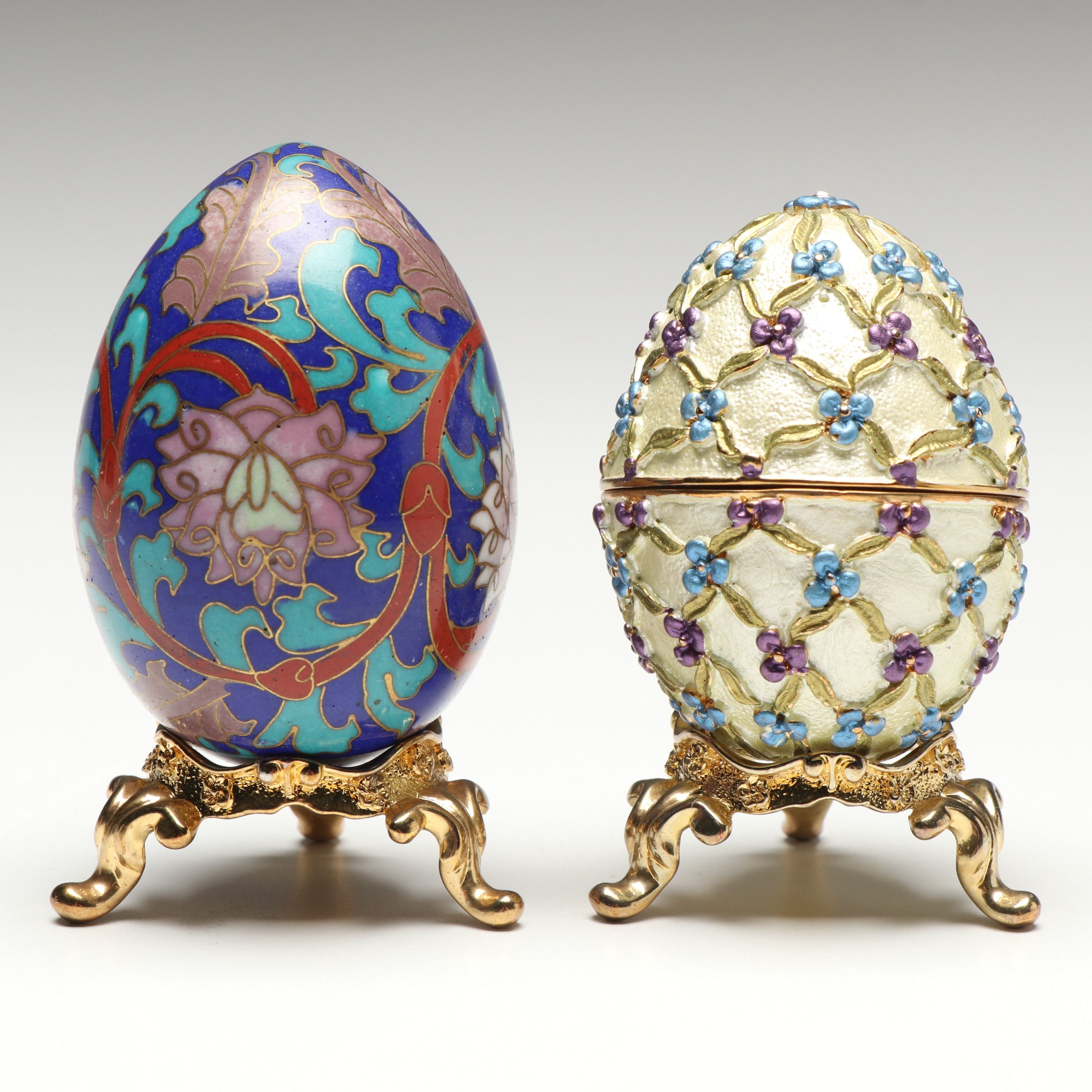 Cloisonné Egg and Other Enameled Egg Box with Ornate Gold Tone Stands