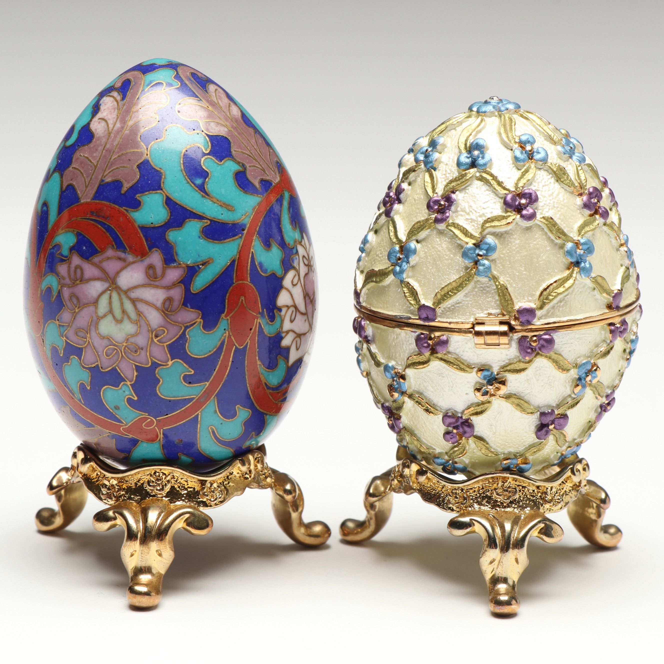 Cloisonné Egg and Other Enameled Egg Box with Ornate Gold Tone Stands