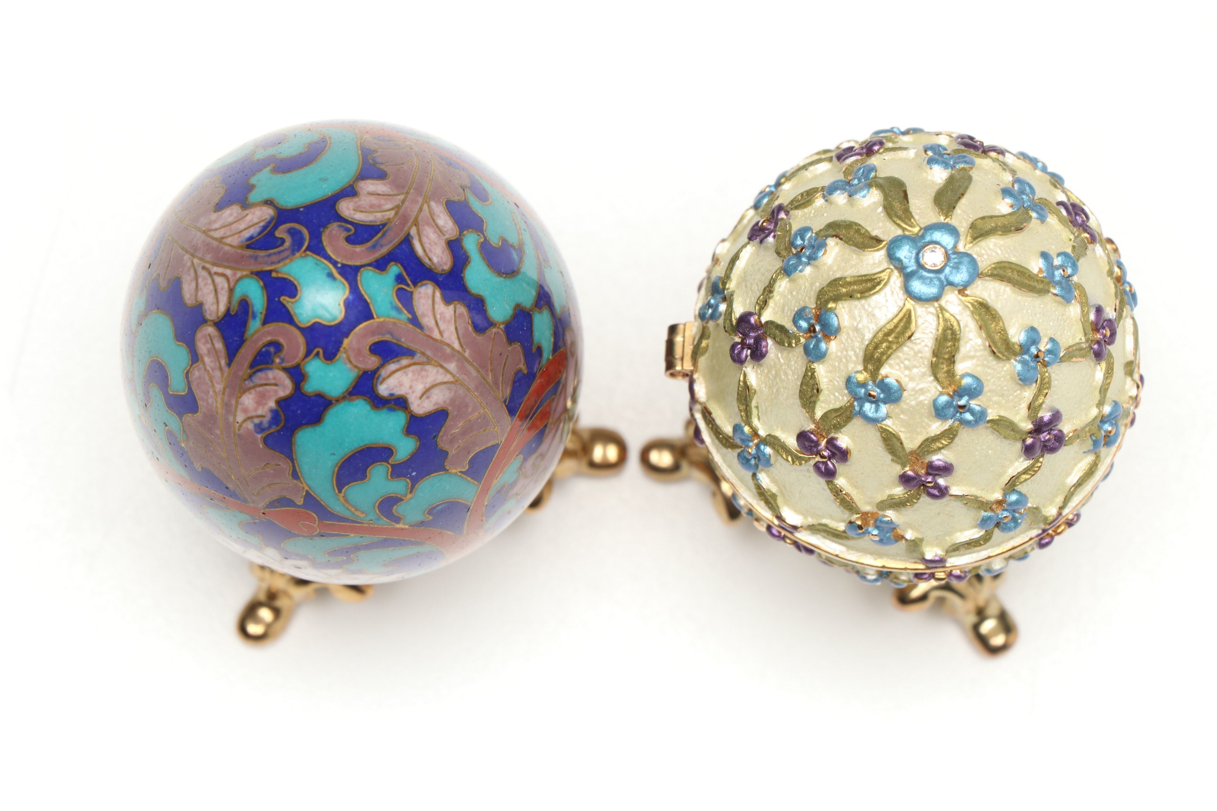 Cloisonné Egg and Other Enameled Egg Box with Ornate Gold Tone Stands