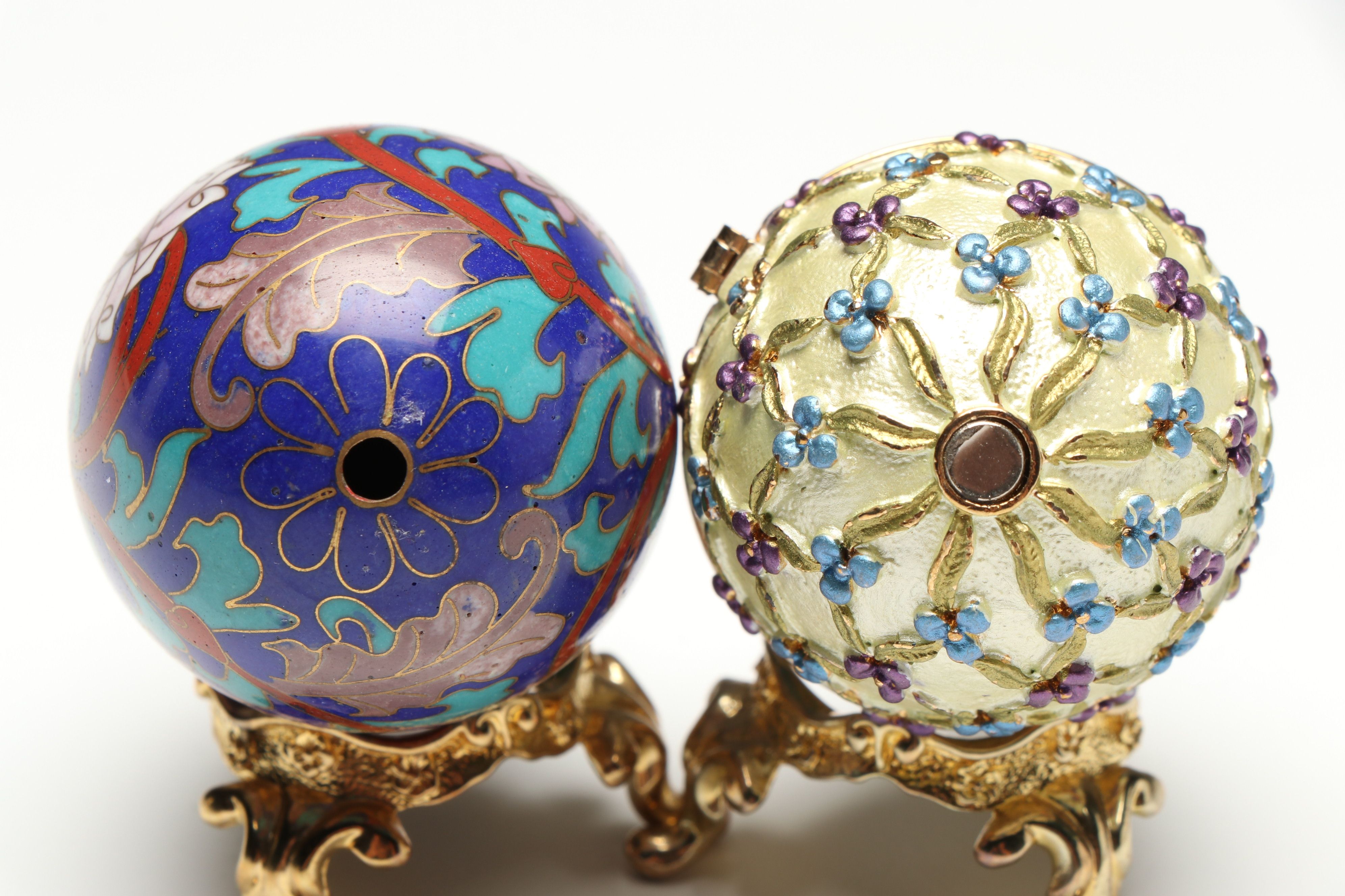 Cloisonné Egg and Other Enameled Egg Box with Ornate Gold Tone Stands