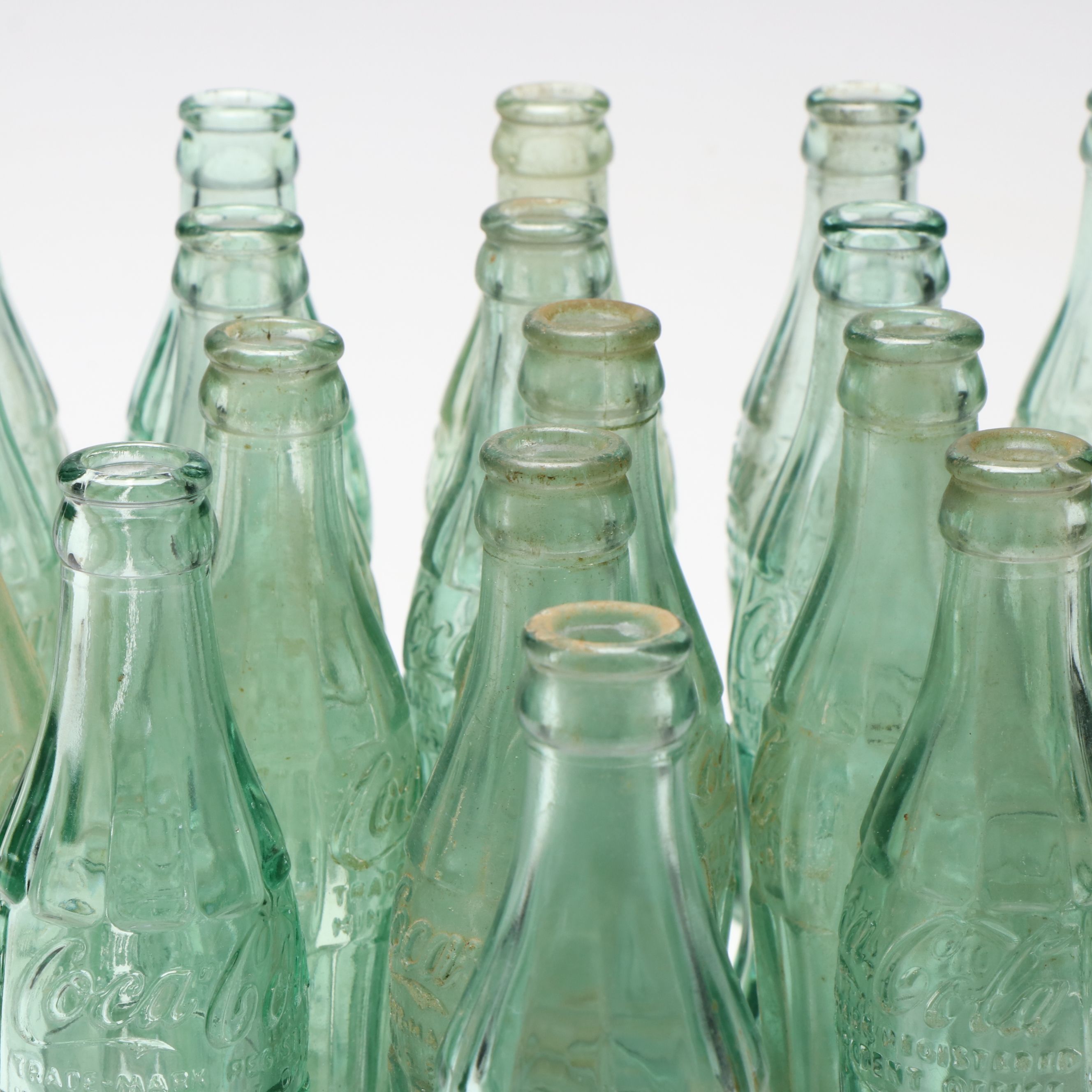 Glass Coca-Cola Hobbleskirt Bottles, Early to Mid-20th C.