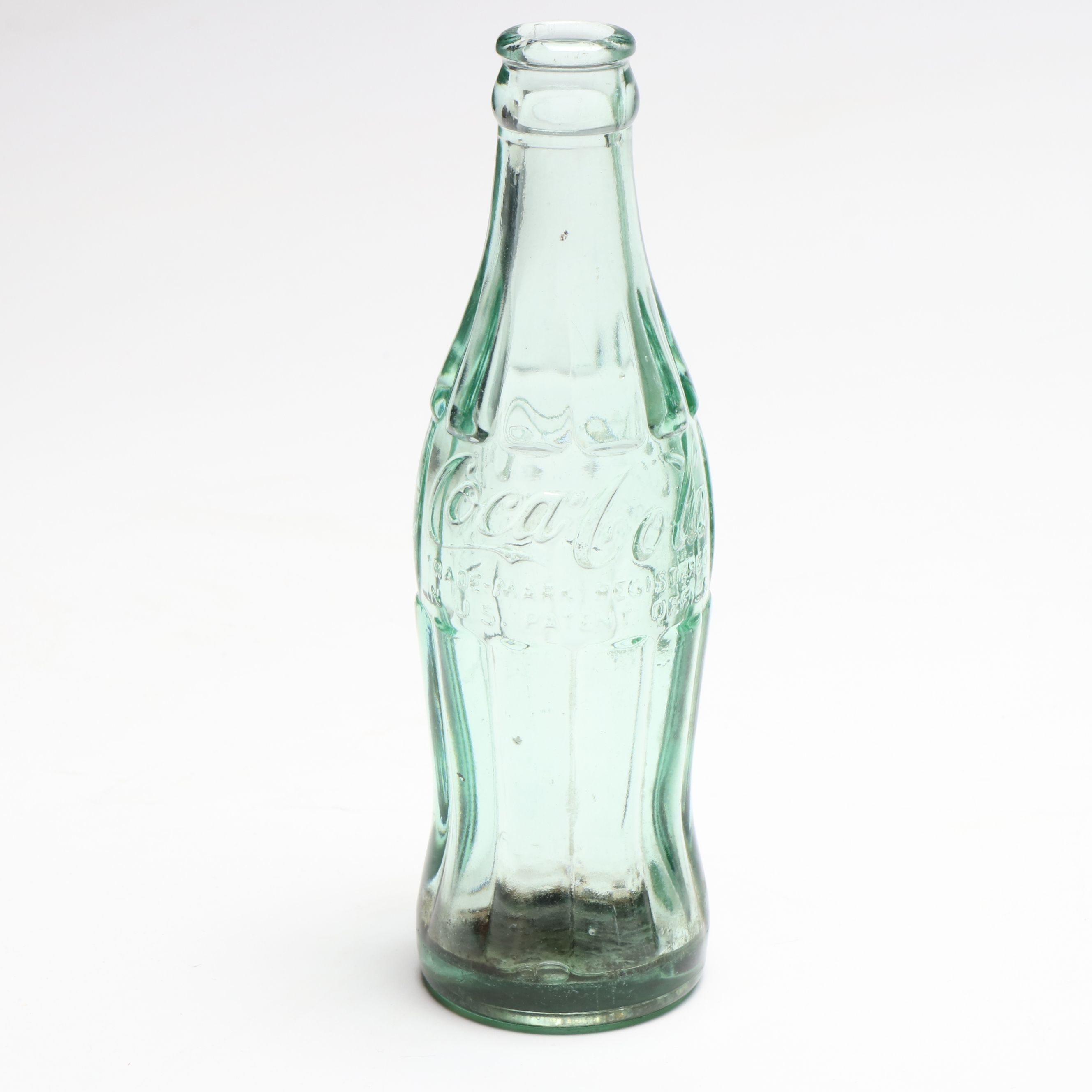 Glass Coca-Cola Hobbleskirt Bottles, Early to Mid-20th C.