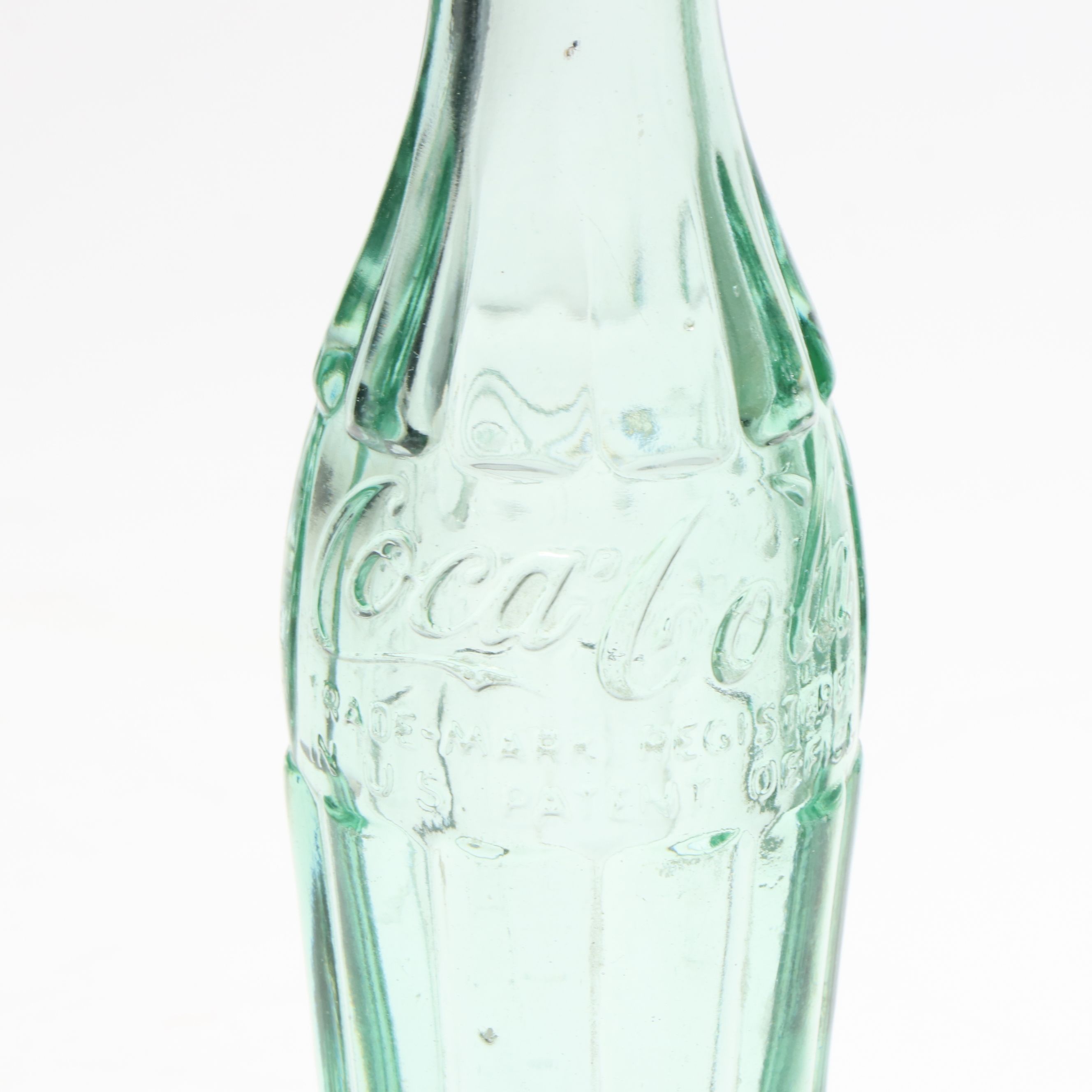 Glass Coca-Cola Hobbleskirt Bottles, Early to Mid-20th C.