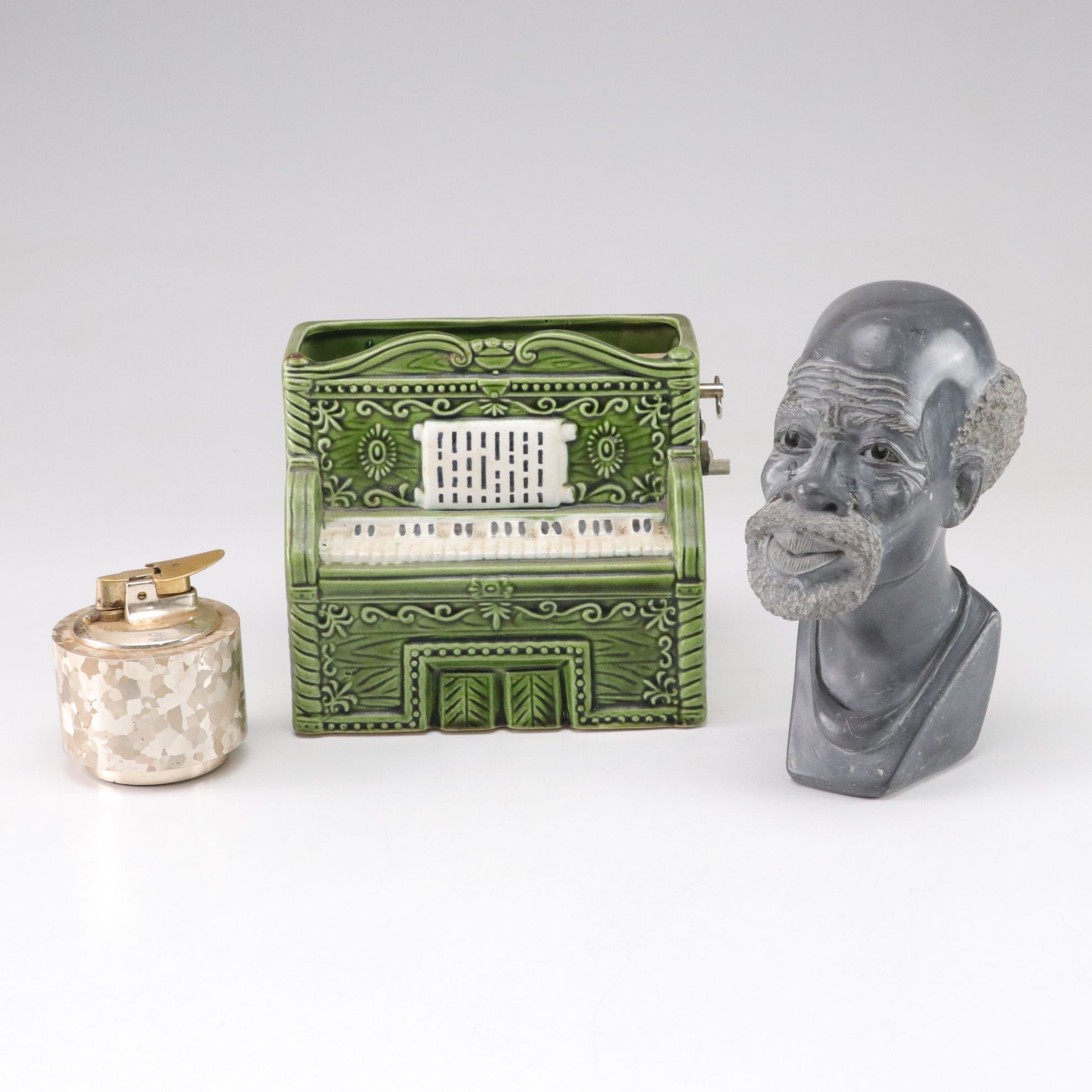 Green Ceramic Piano, Varaflame Luralite Lighter and Shona Stone Bust