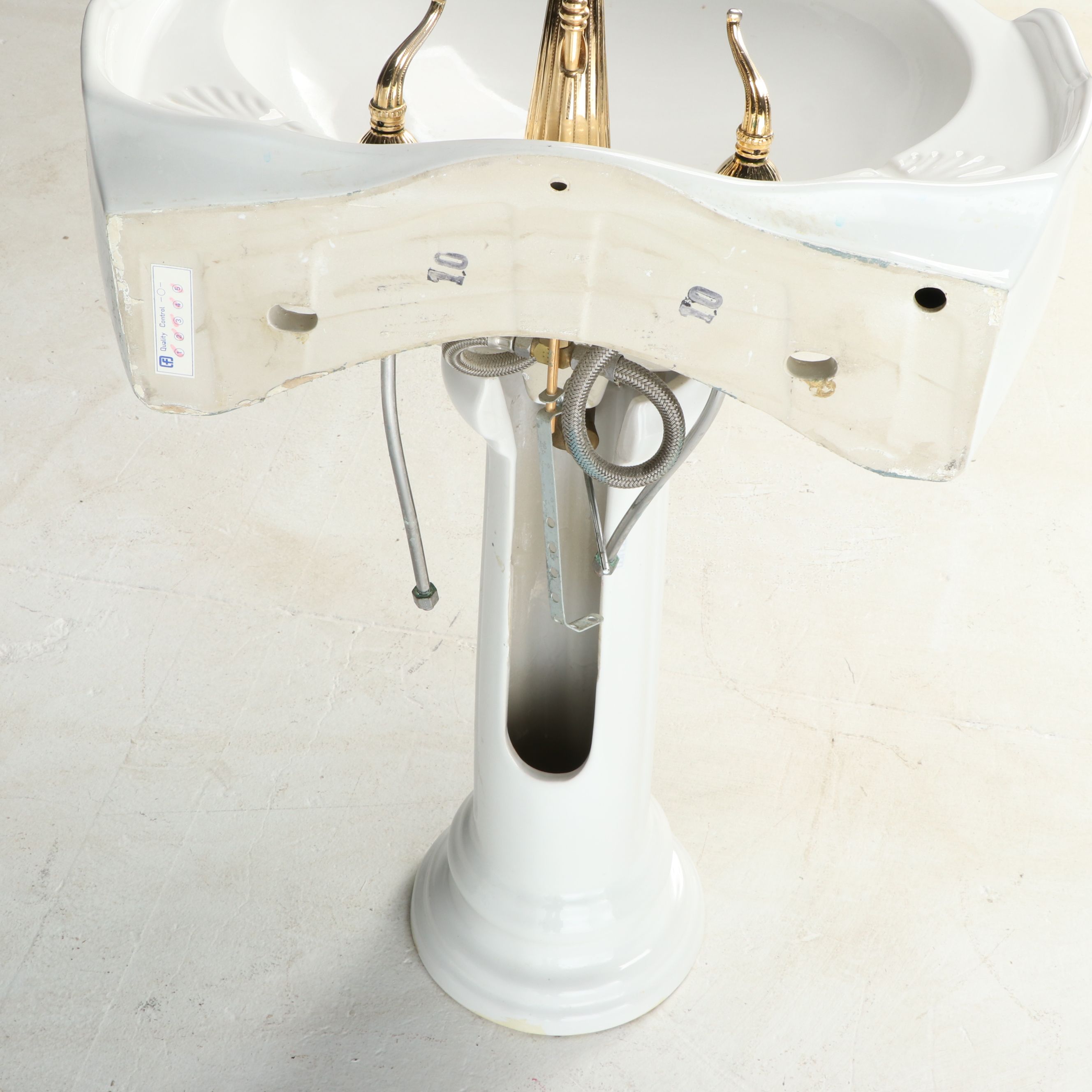 Porcelain Pedestal Sink with Brass and Metal Hardware