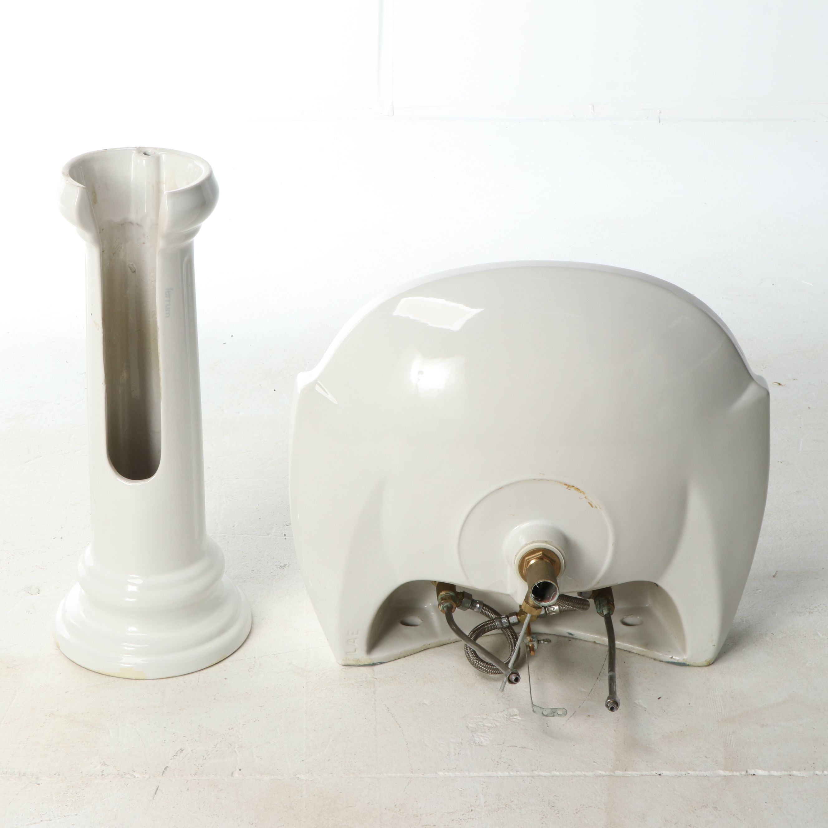 Porcelain Pedestal Sink with Brass and Metal Hardware