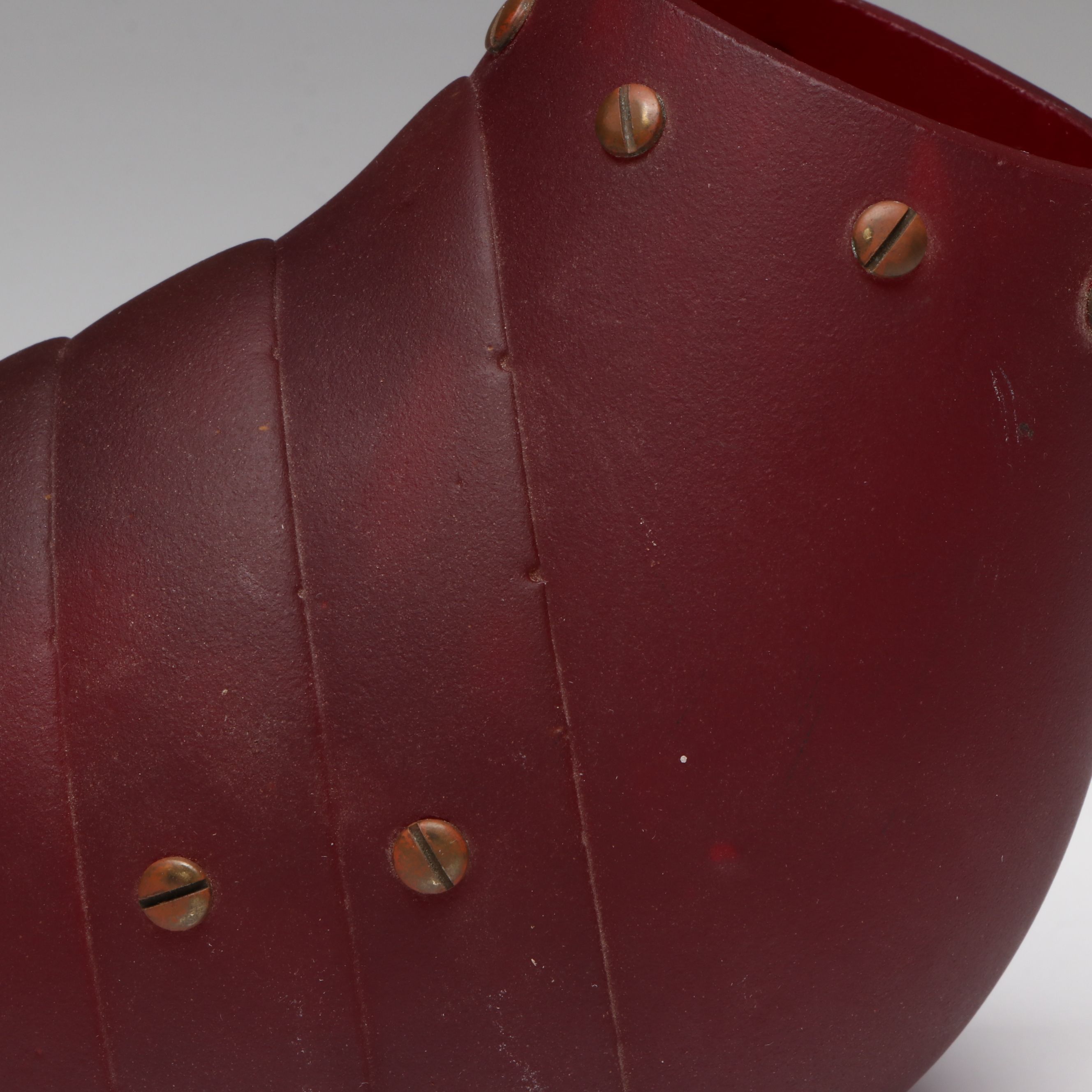 Industrial Style Segmented Ruby Satin Glass Form with Copper Rivets