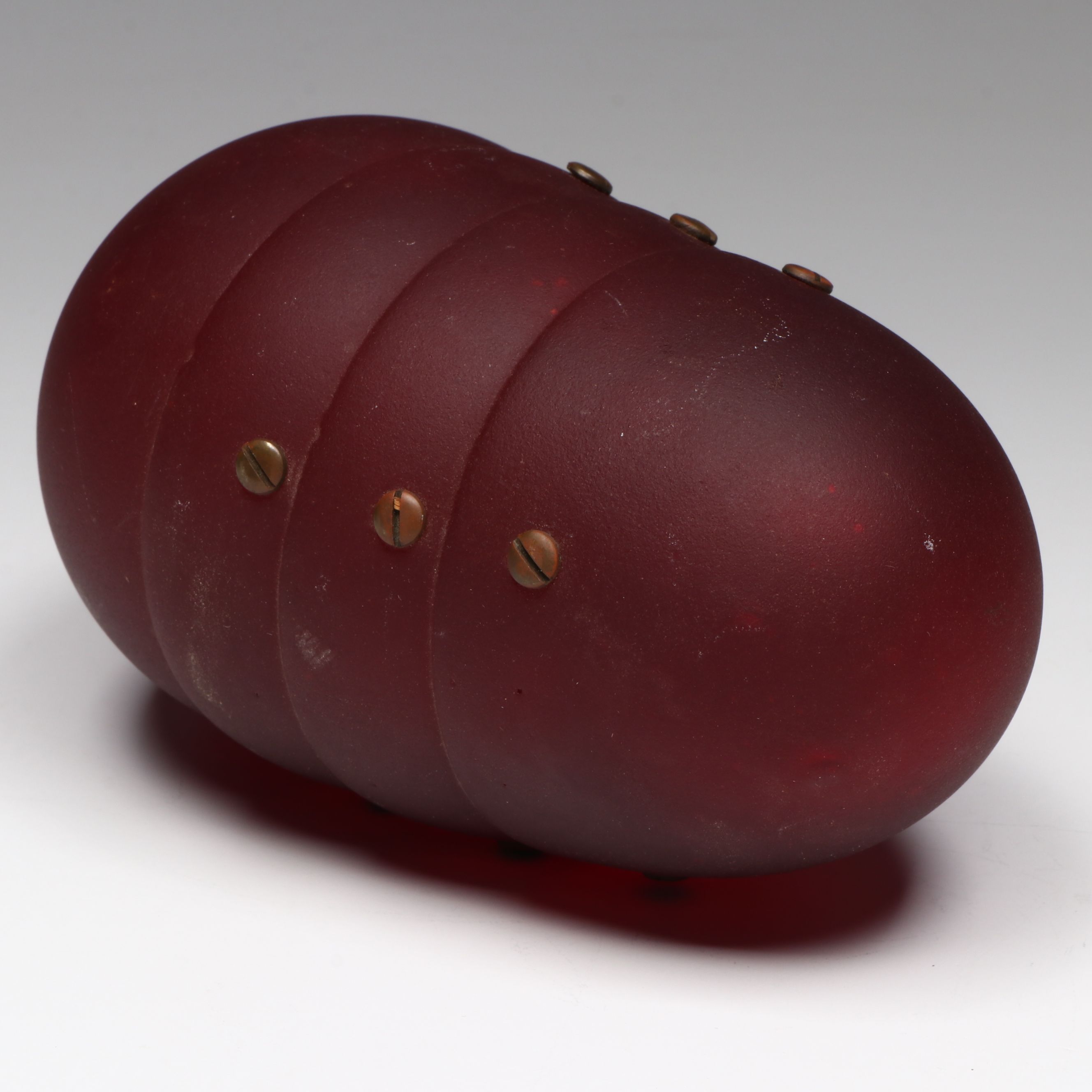 Industrial Style Segmented Ruby Satin Glass Form with Copper Rivets