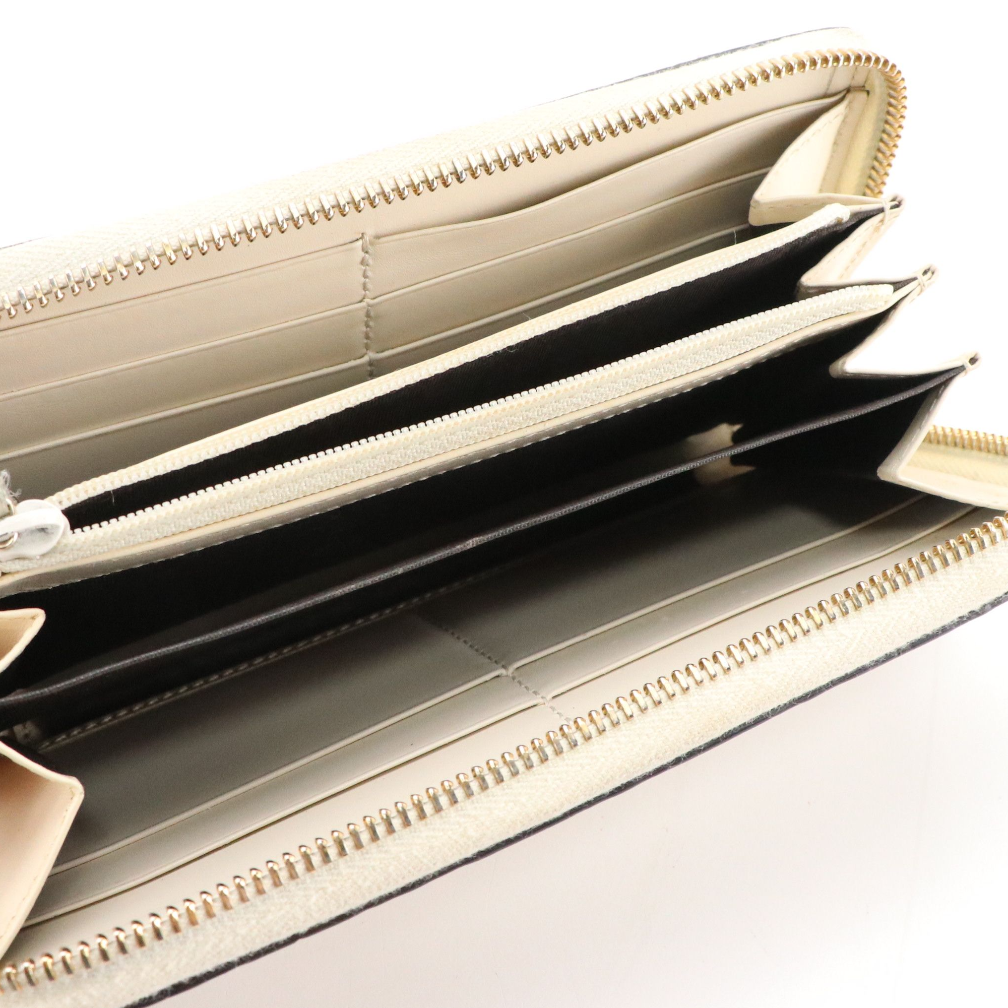 Gucci Zip Around Bow Wallet in White Guccissima Calfskin Leather