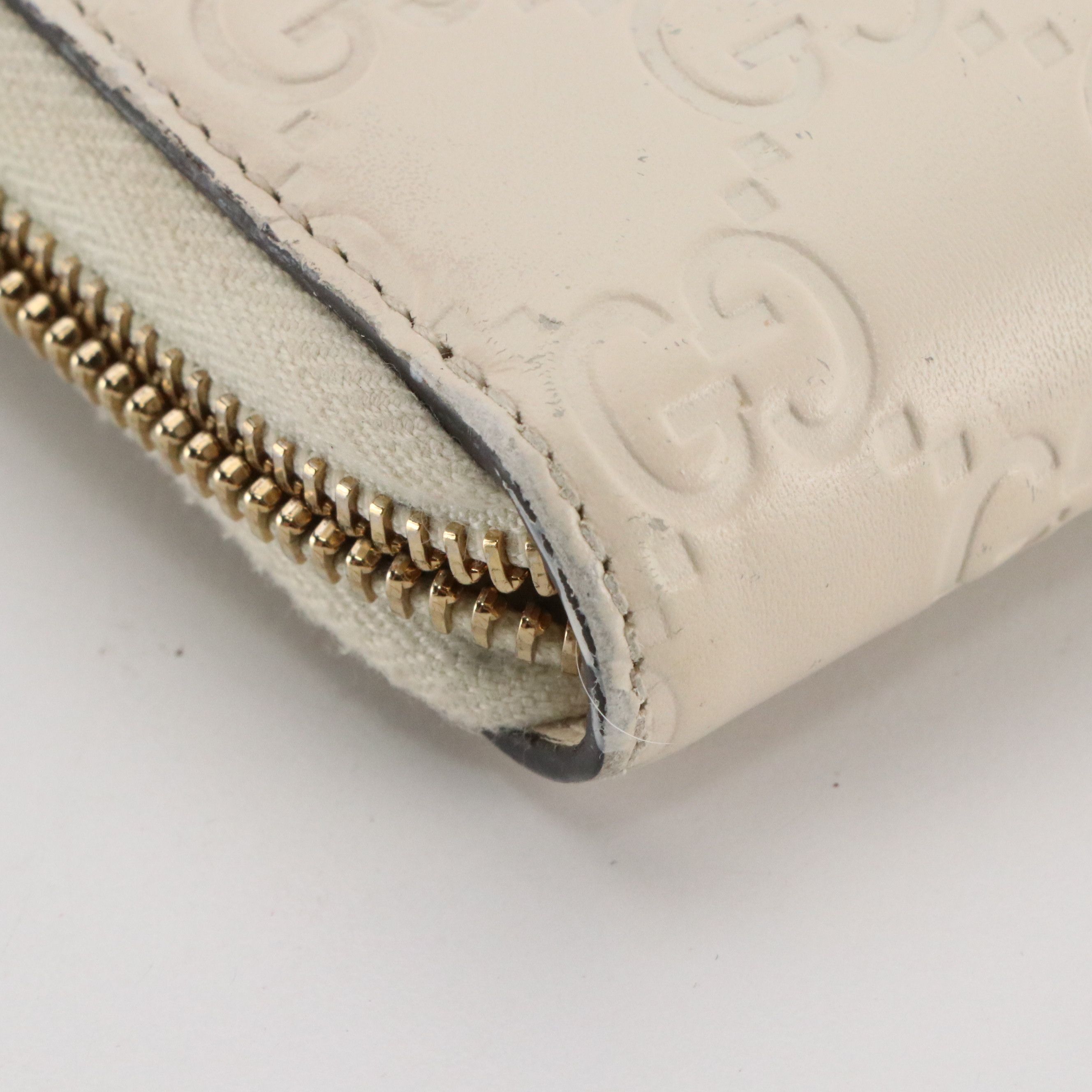 Gucci Zip Around Bow Wallet in White Guccissima Calfskin Leather