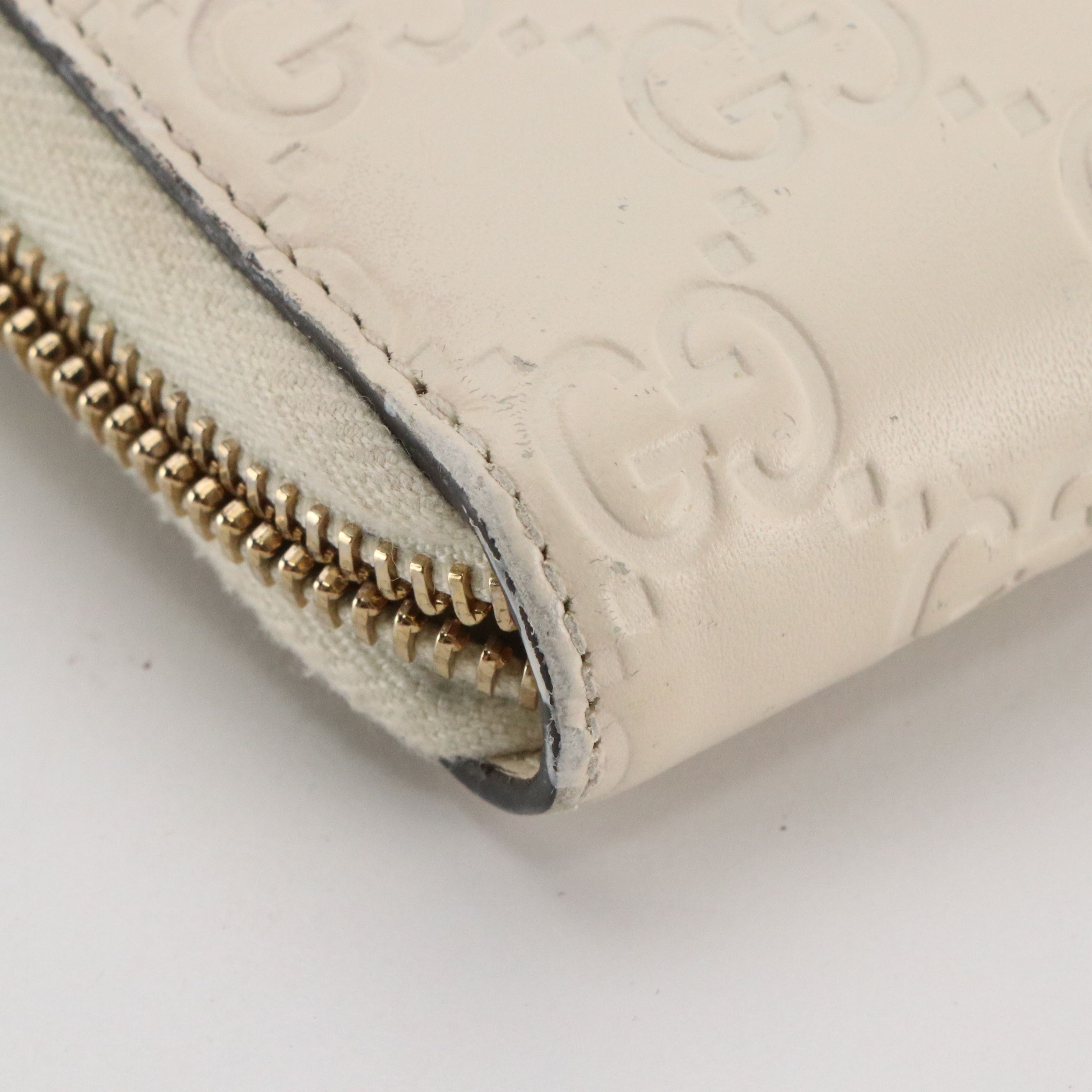 Gucci Zip Around Bow Wallet in White Guccissima Calfskin Leather