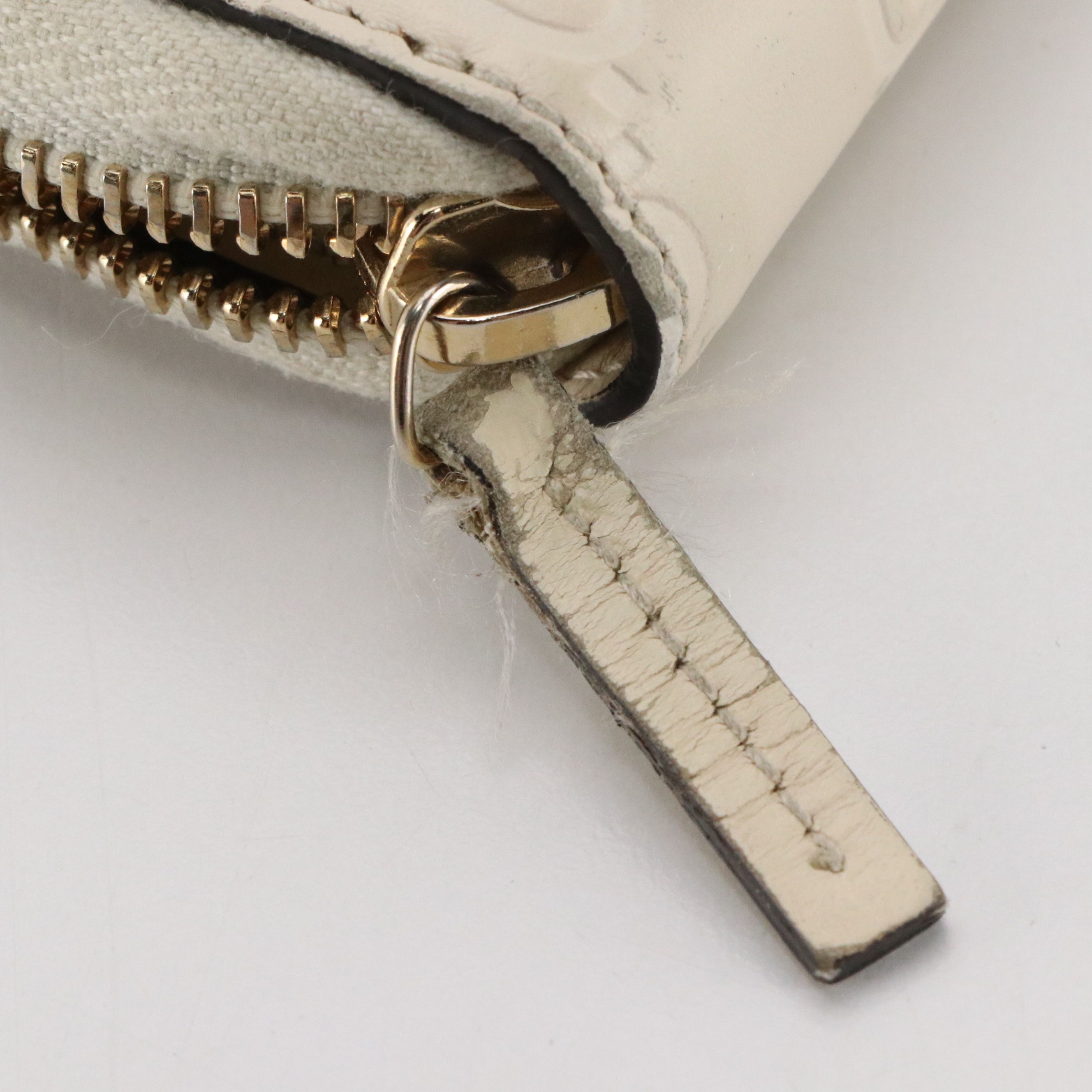 Gucci Zip Around Bow Wallet in White Guccissima Calfskin Leather