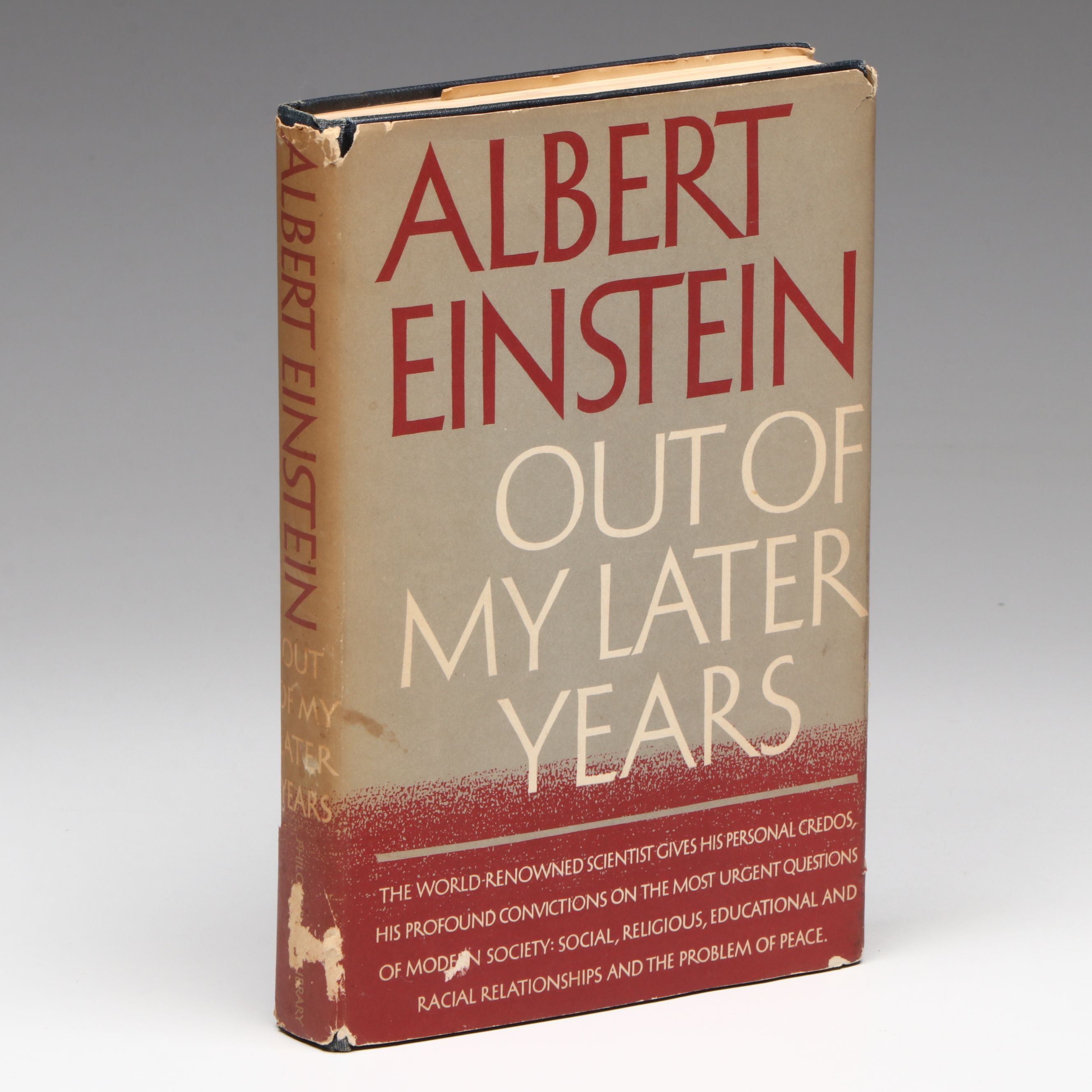 "Out of My Later Years" by Albert Einstein with Newspaper Clipping