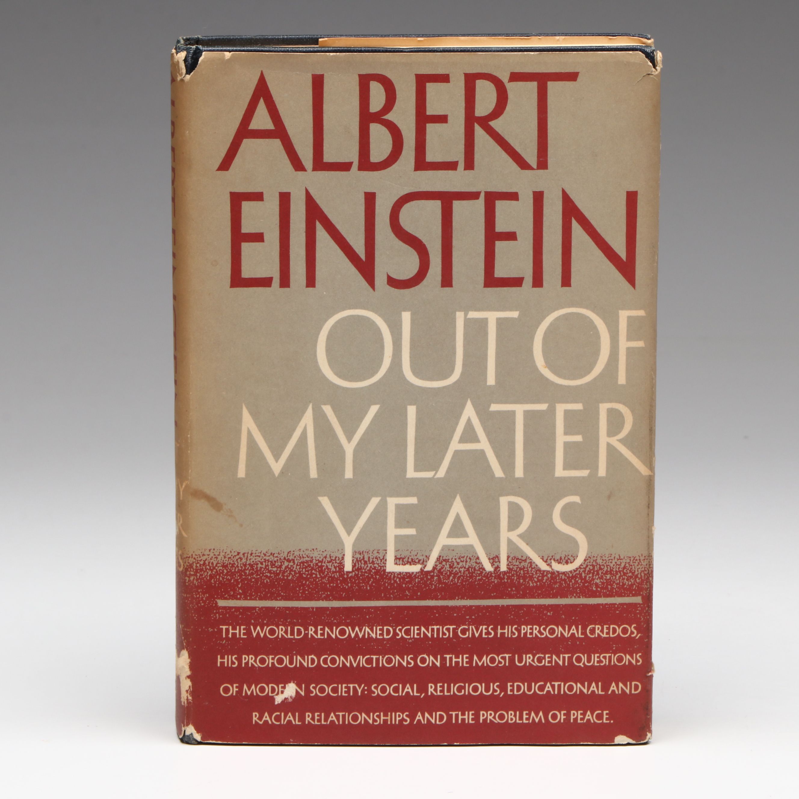 "Out of My Later Years" by Albert Einstein with Newspaper Clipping