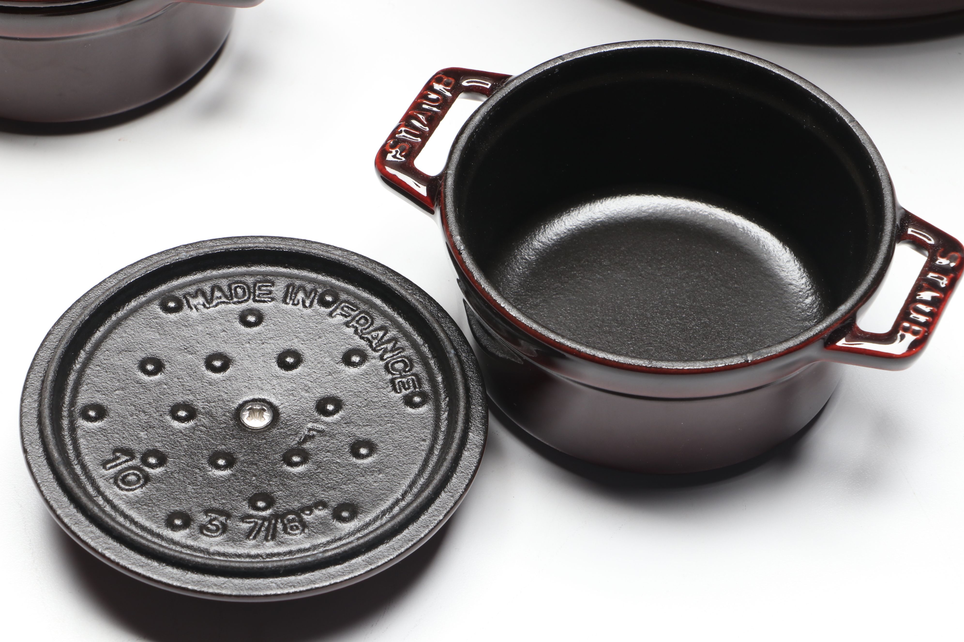 Staub "Grenadine" Enameled Cast Iron Round Dutch Ovens