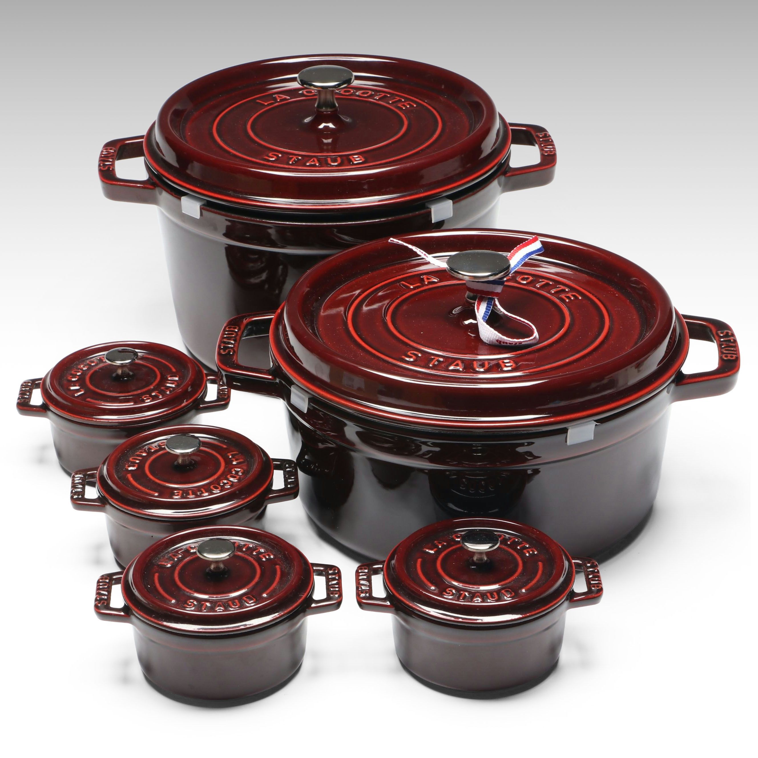 Staub "Grenadine" Enameled Cast Iron Round Dutch Ovens