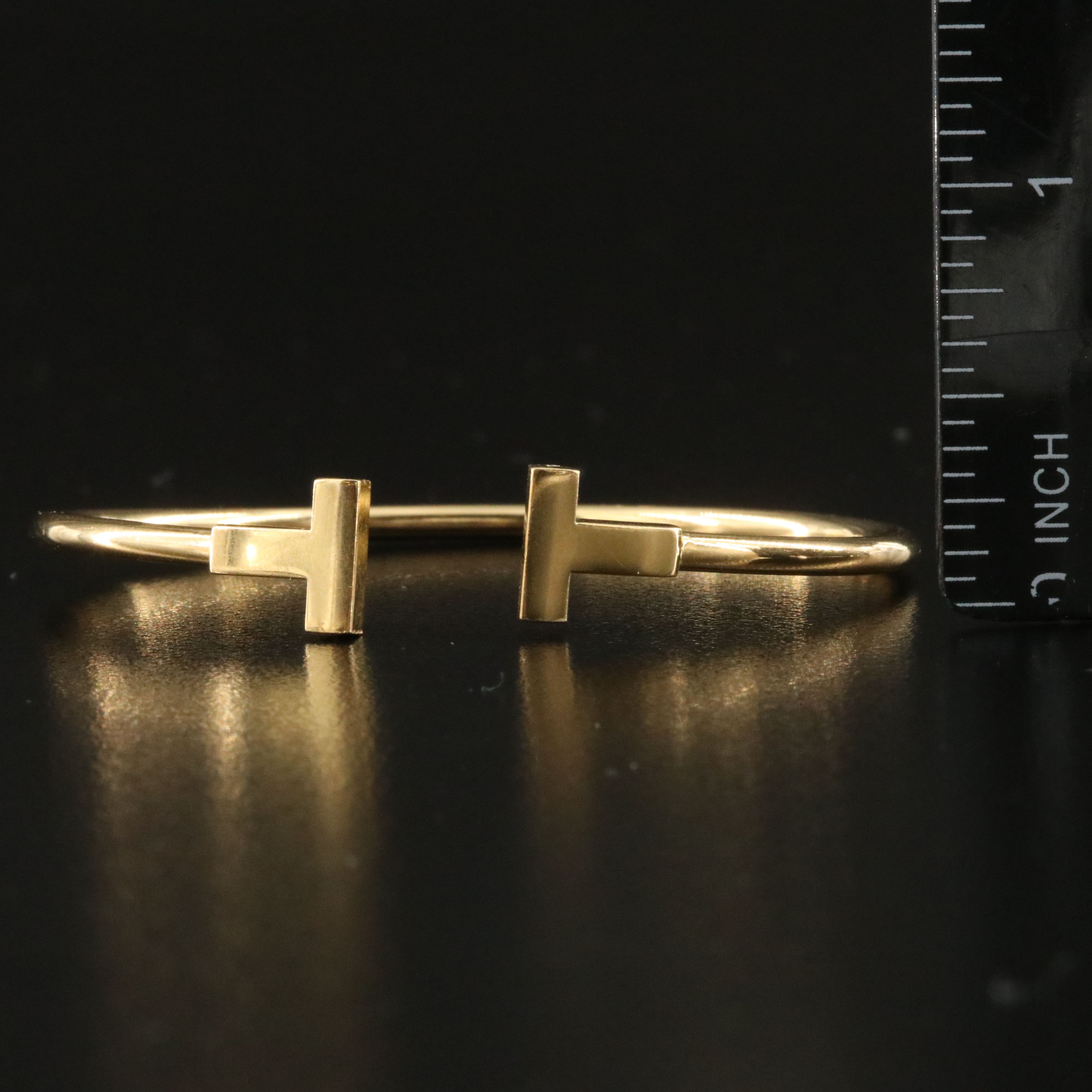 Tiffany & Co. "T" 18K Flexible Wire Bracelet