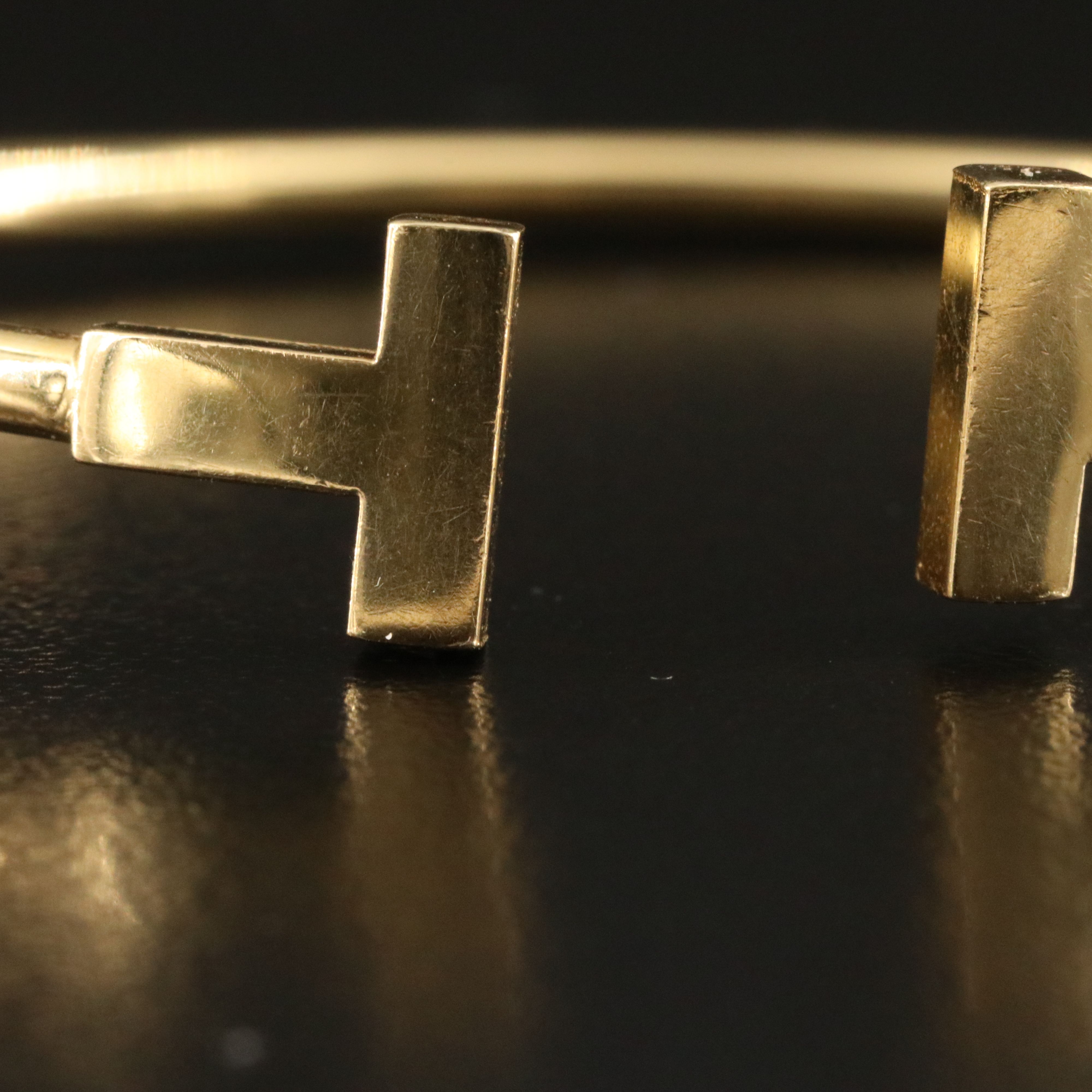 Tiffany & Co. "T" 18K Flexible Wire Bracelet
