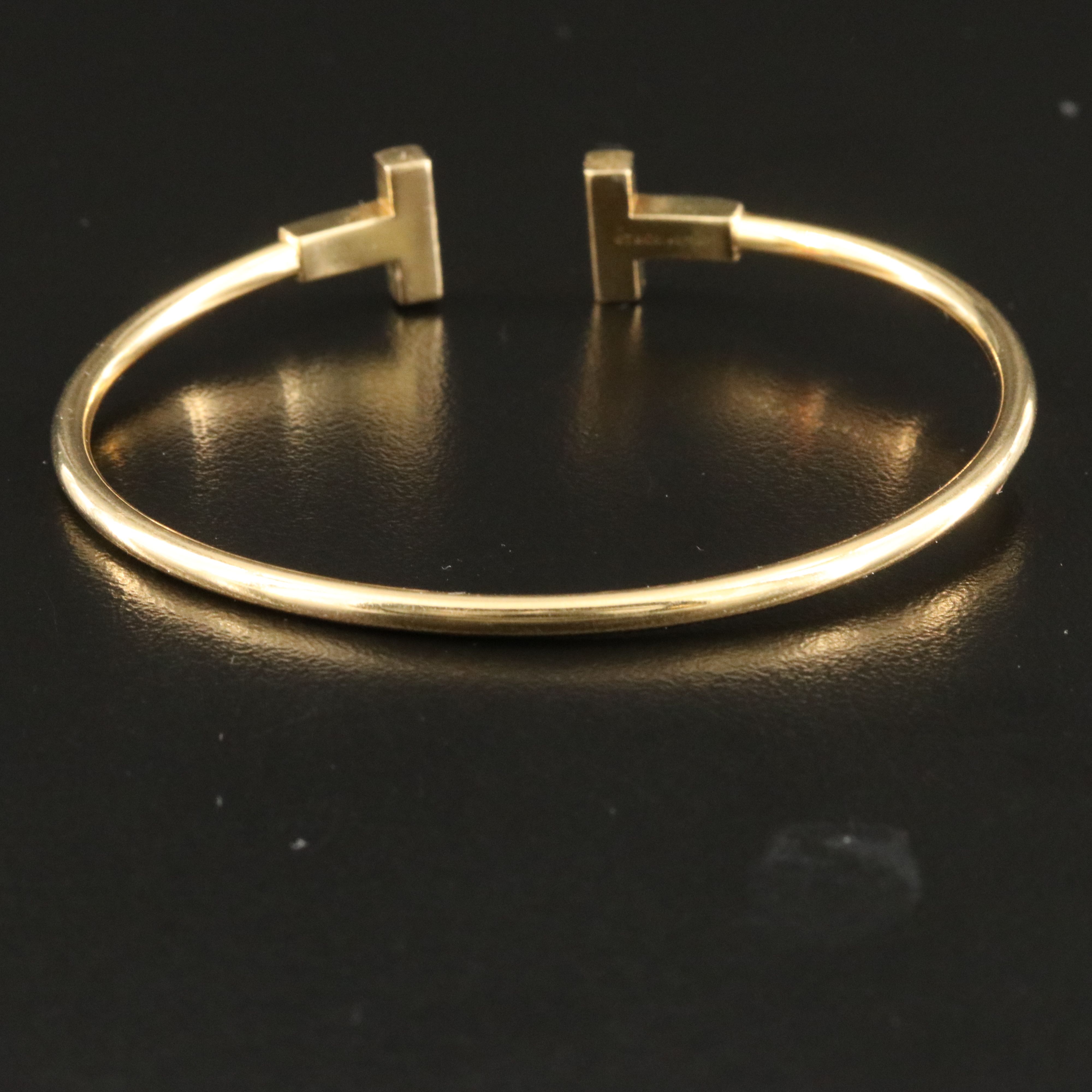 Tiffany & Co. "T" 18K Flexible Wire Bracelet
